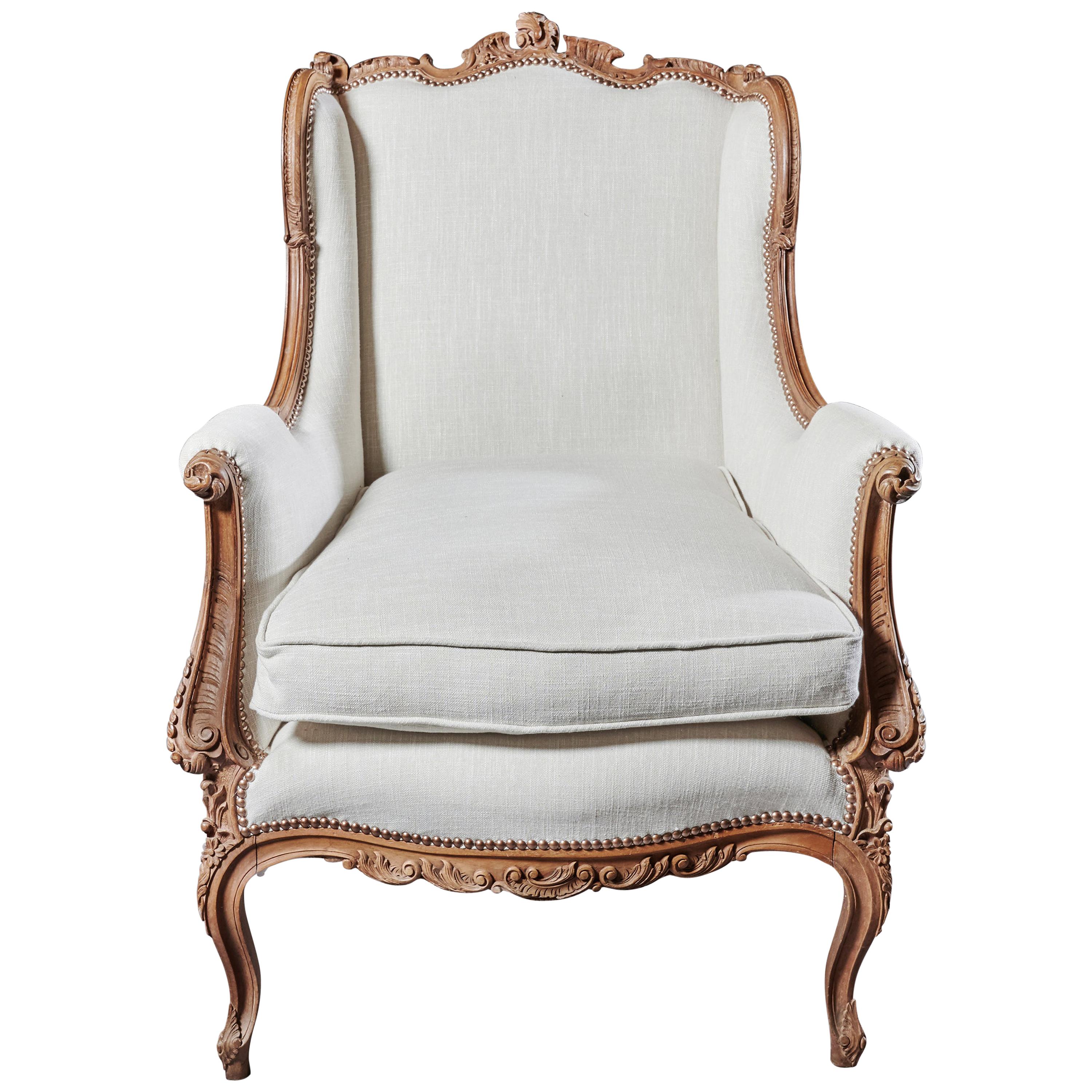 Finely Carved 19th Century French Louis XV Style Wing Armchair