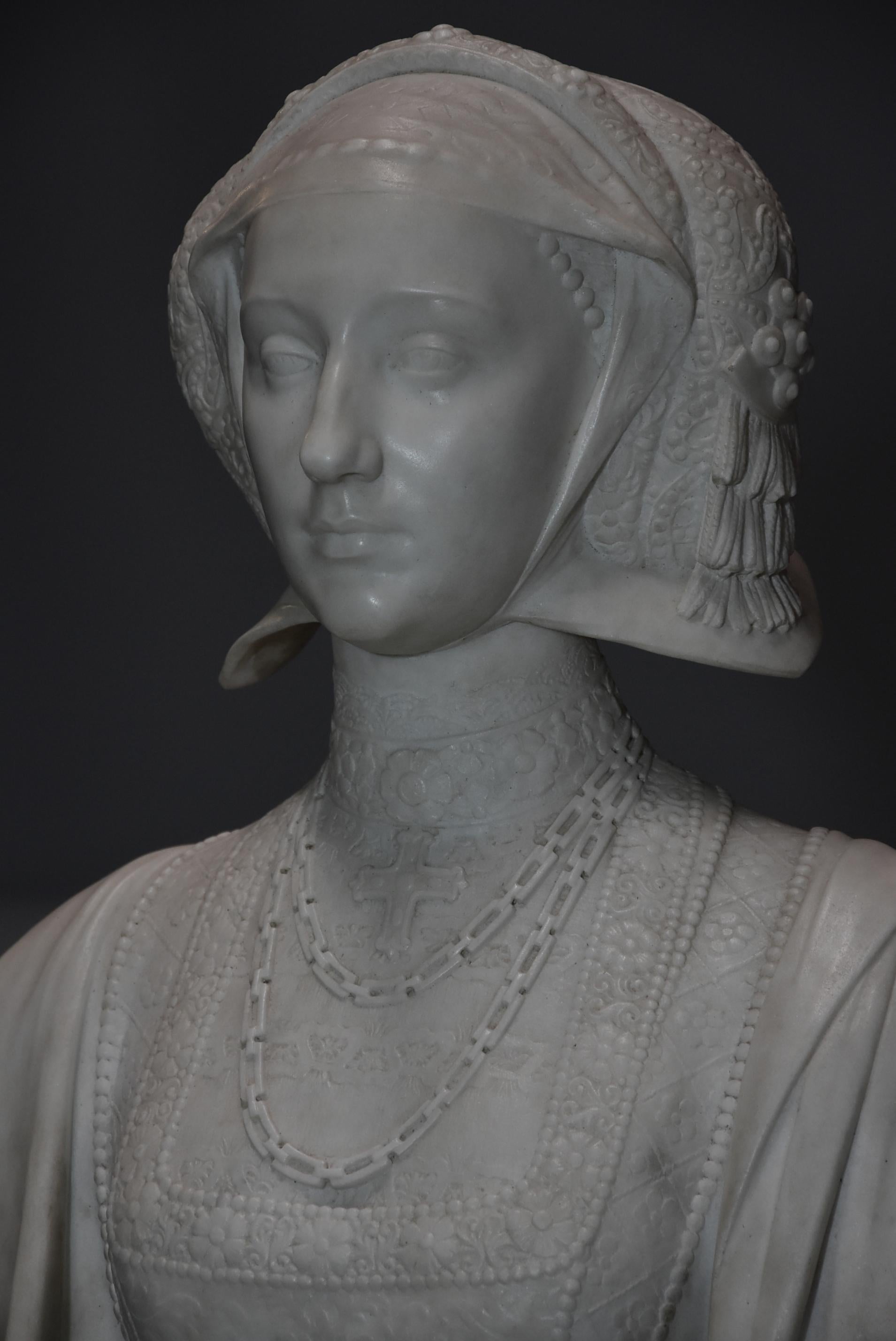 A finely carved early 19th century (circa 1820) lifesize Carrara marble figure of Anne of Cleves (1515-1557) inscribed ‘Anne de Cleve Reine’, possibly Italian.

The marble sculpture has a superbly carved face of Anne of Cleves wearing a lace hood