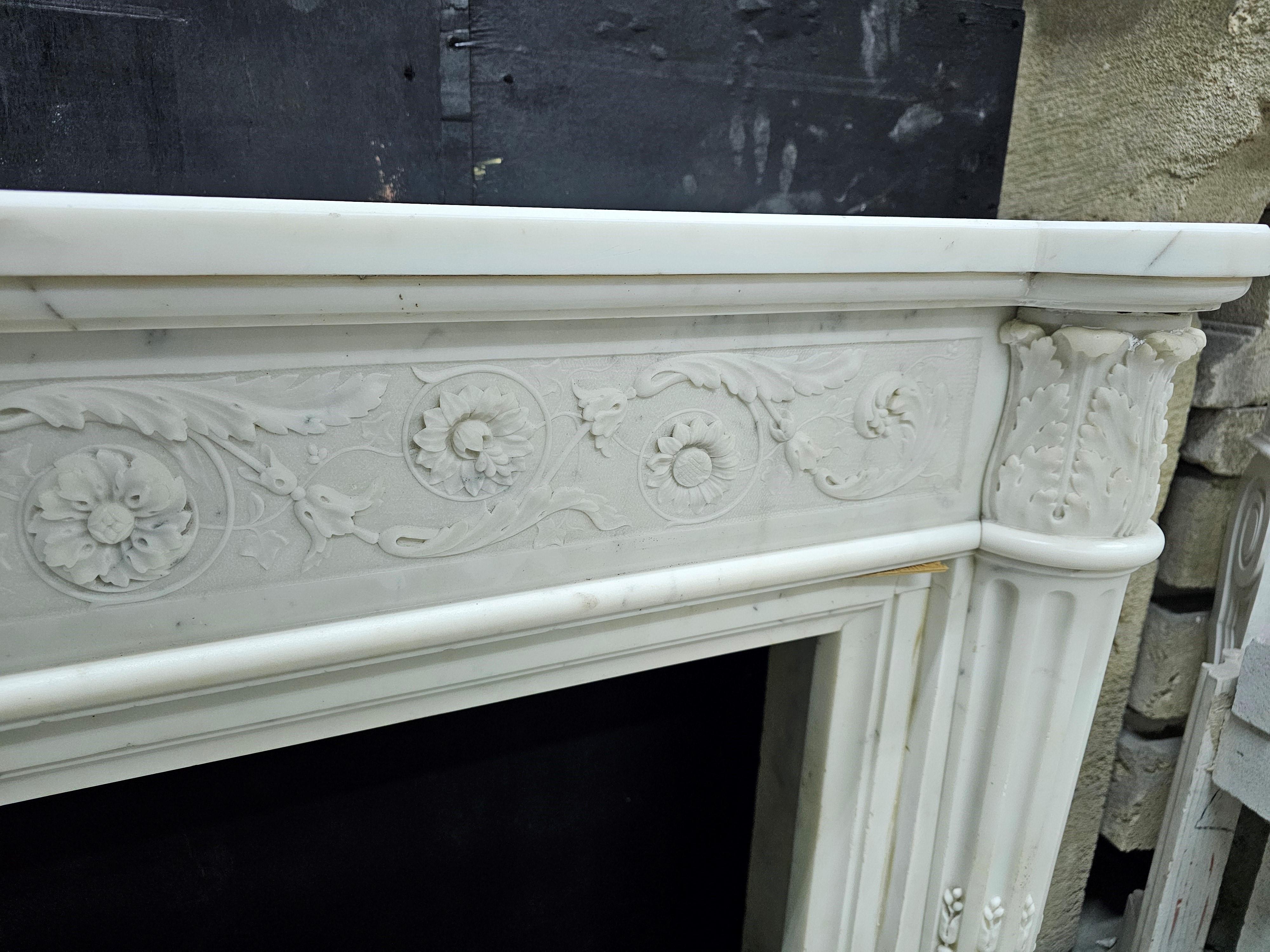Statuary Marble Finely Carved Early 19th Century French Chimneypiece For Sale