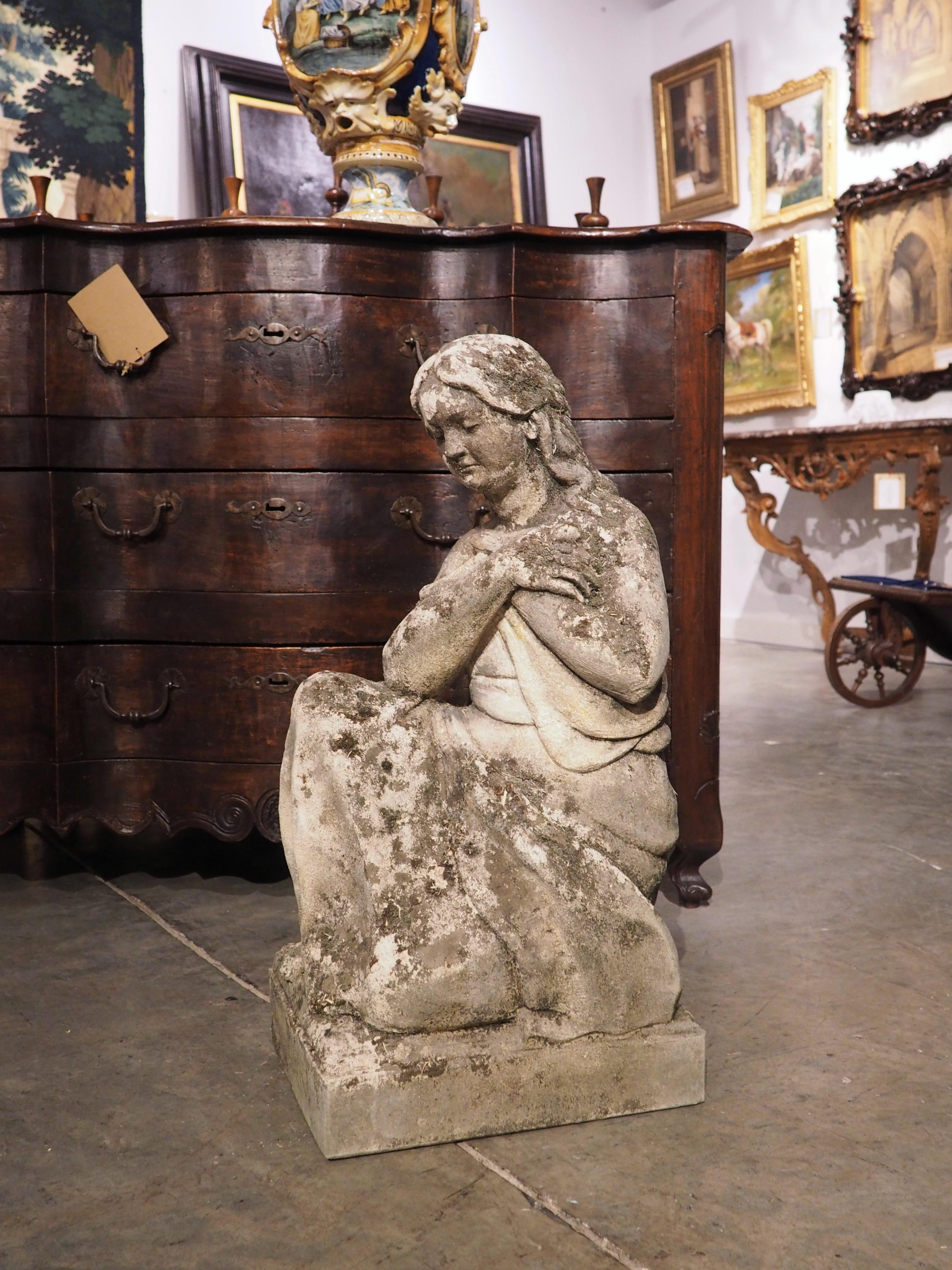 Contemporary Finely Carved Italian Limestone Statue of a Woman Holding a Bird For Sale
