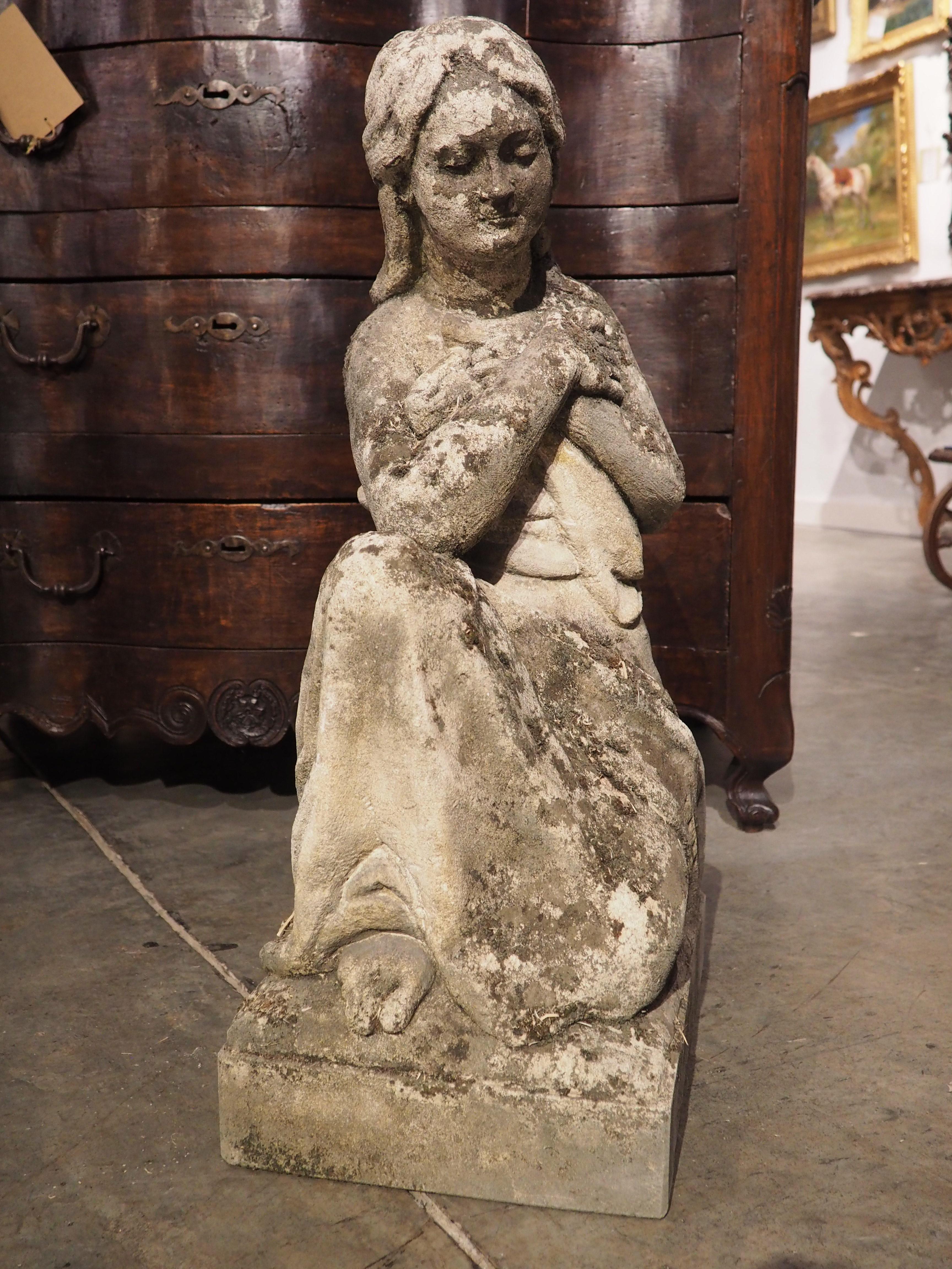 Finely Carved Italian Limestone Statue of a Woman Holding a Bird For Sale 1