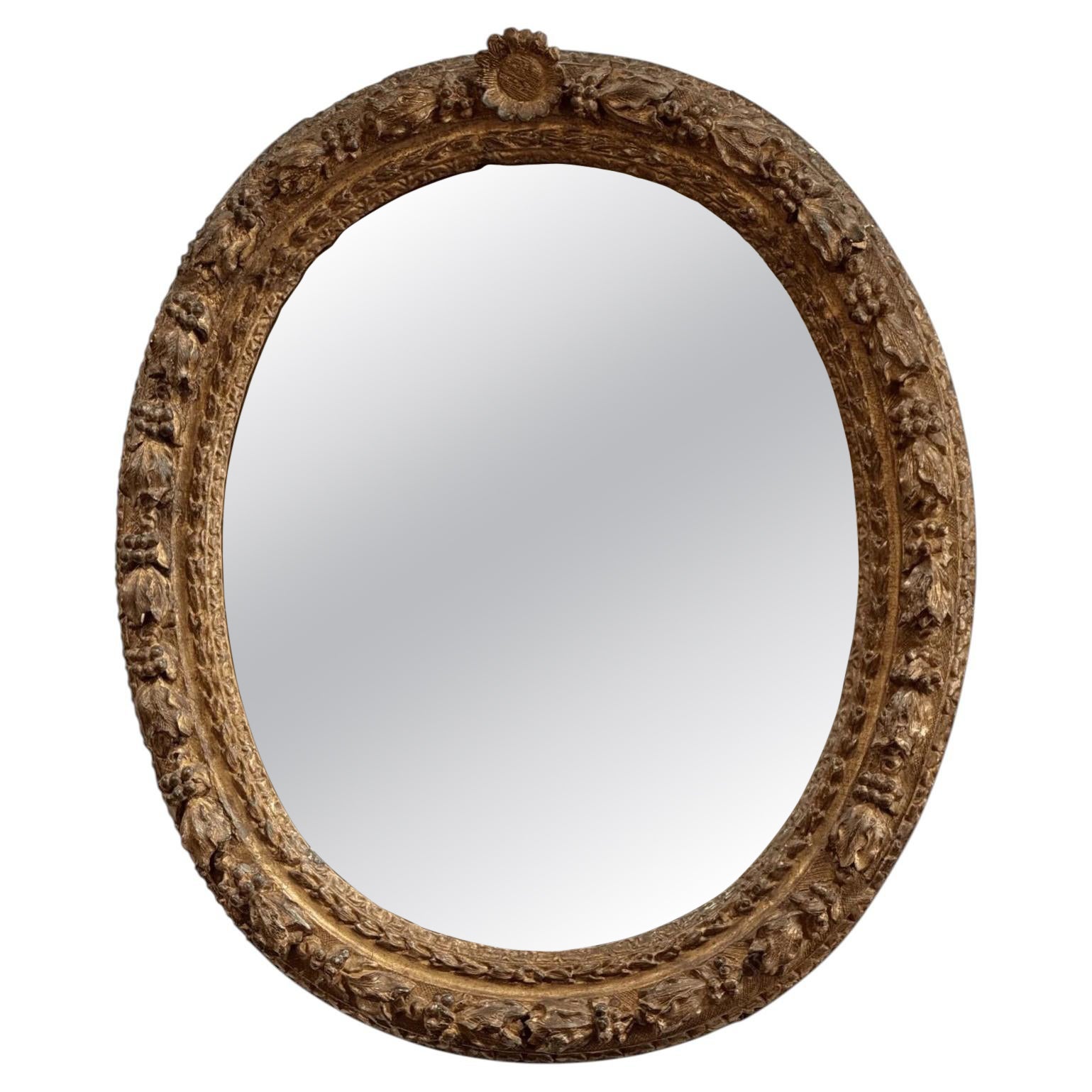 Finely carved Louis XIV period oval mirror, 18th century For Sale