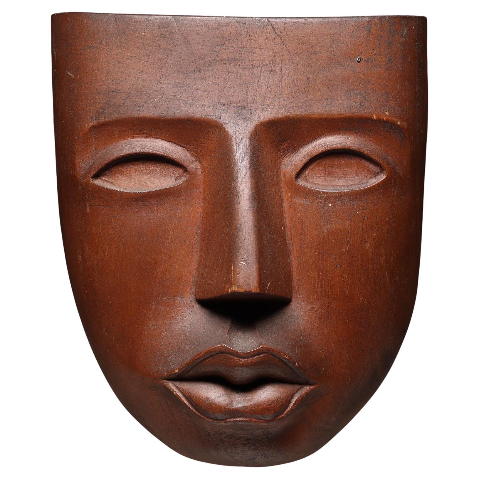Masque en bois finement sculpté du milieu du siècle de la côte nord-ouest visage expressif