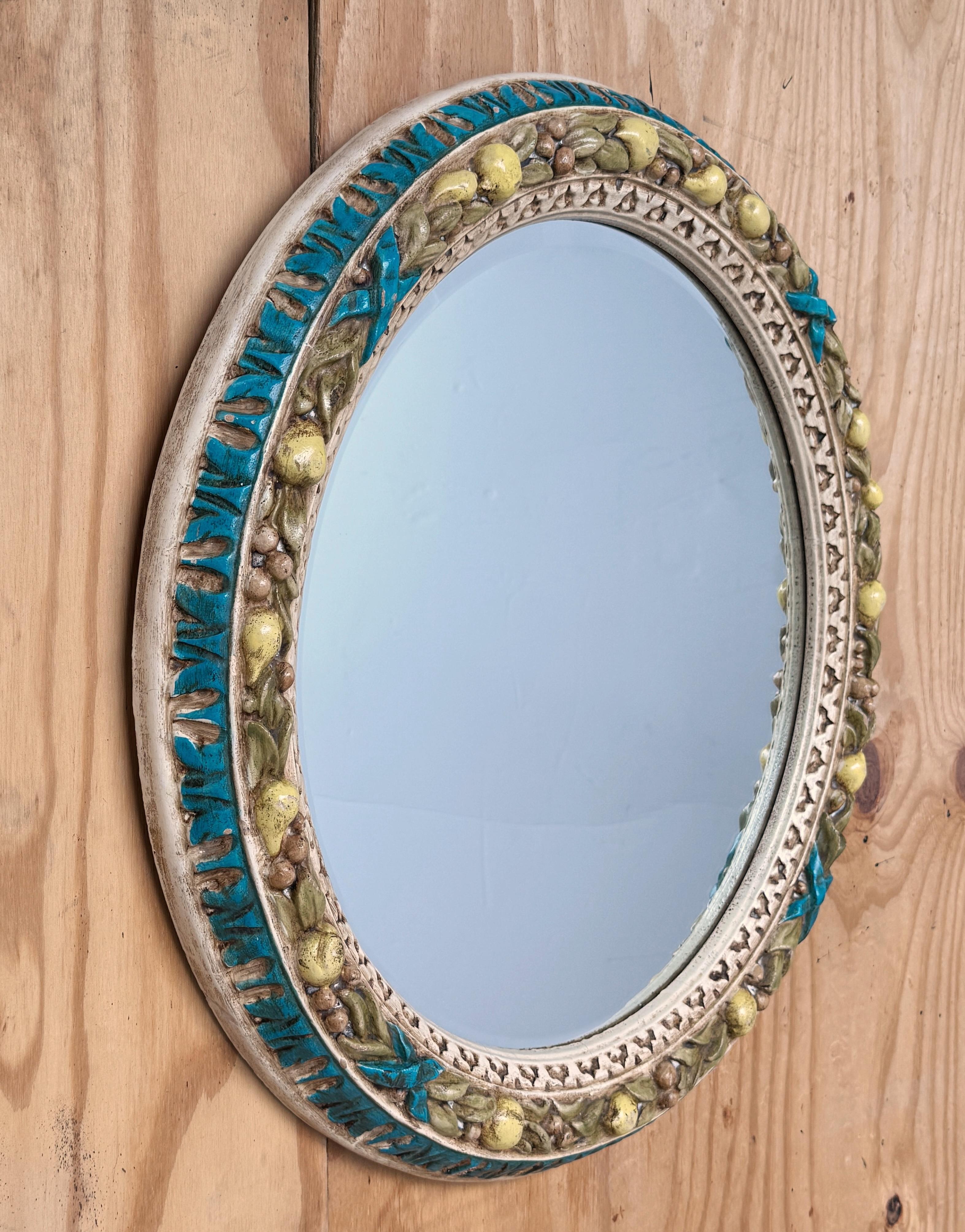 20th Century Finely Carved Round Florentine Polychromed & Gilt Lemon, Laurel Wood Mirror For Sale