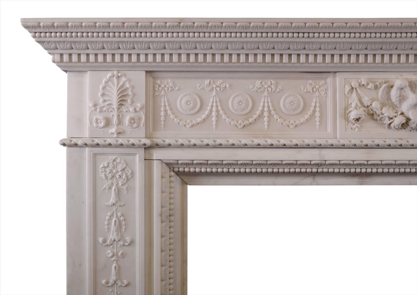 A fine quality statuary marble late Georgian fireplace. The panelled jambs with finely carved bellflowers and ribbons, surmounted by rope moulding and end blocks with anthemion leaf. The frieze with rosette paterae and drapery throughout, with