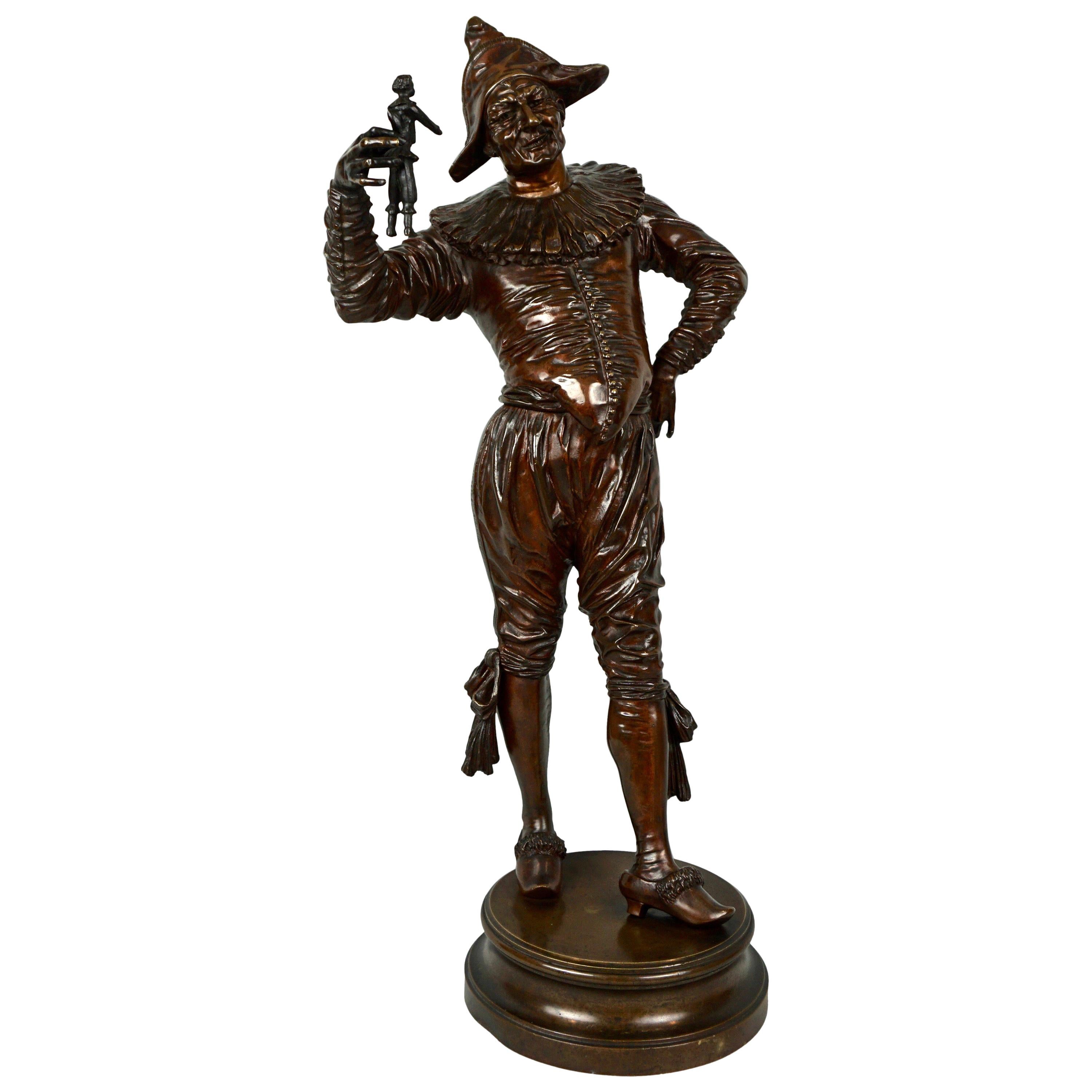 Finely Cast Bronze Jester Holding Doll by G. Gueyton 'French 1841-1919' For Sale