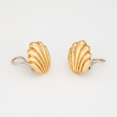 Finely detailed pair of vintage Tiffany & Co shell earrings crafted in 18k yello