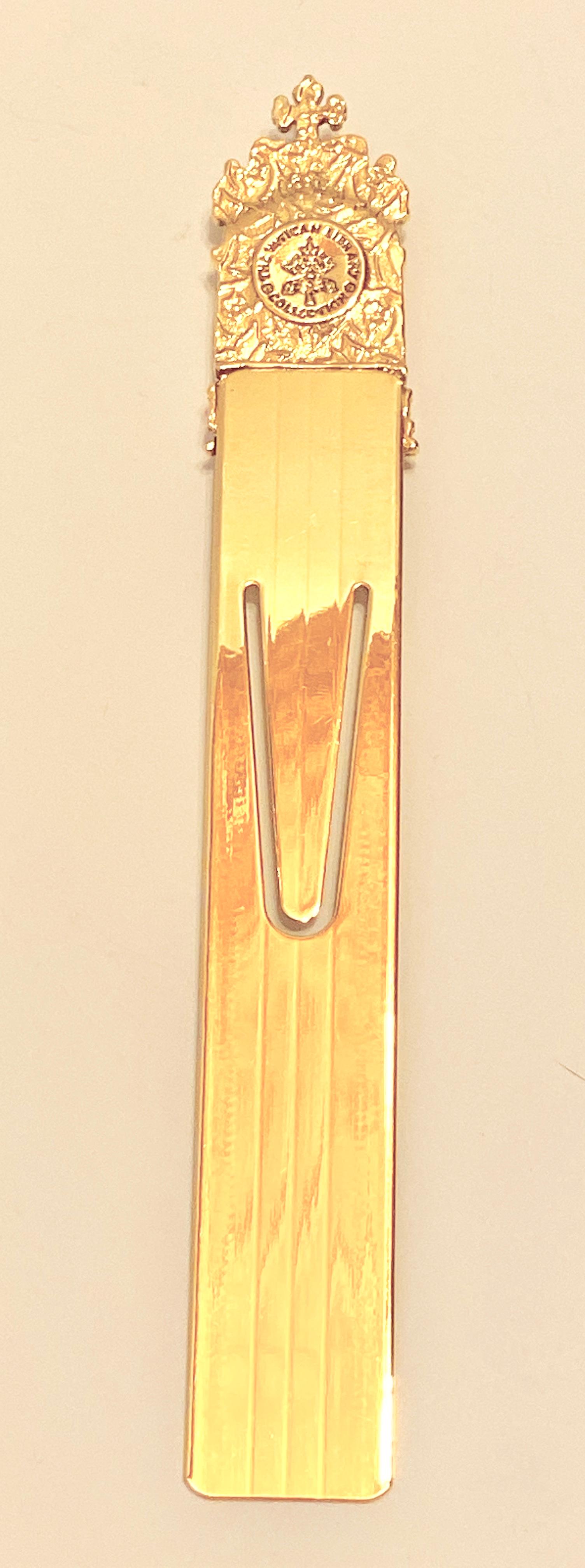 Finely polished gilded gold vermeil hardware Vatican Book Mark measures 6 inches by 1 inch. Delicate details of the Virgin Mary with Child. Made in Italy.