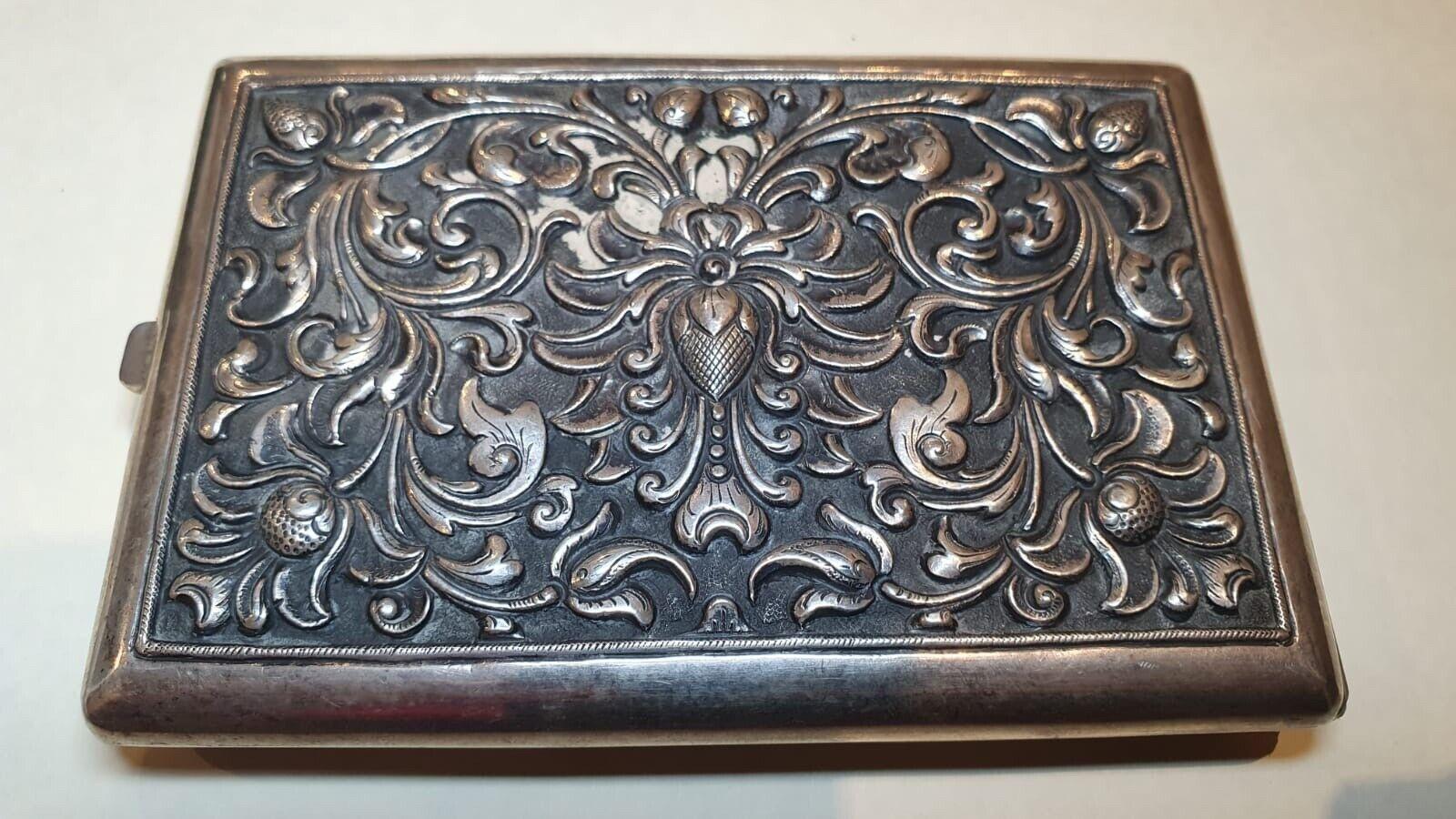 Superbly detailed hinged Cigar Case, 
dating back to late 1800's 

Measuring 12cm (L) x 8cm (W)
& being 15mm thick 
featuring gorgeous floral embossing 
from both sides 

bearing 800 silver stamp 
Provenance: Europe 

Total item's weight: 129.6gr.