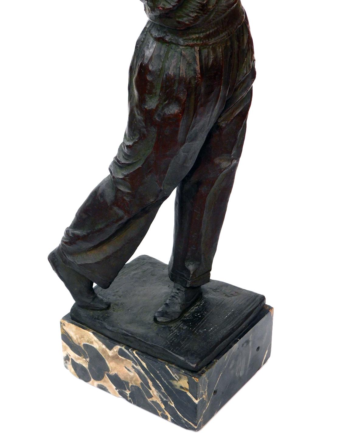 vintage golfer statue