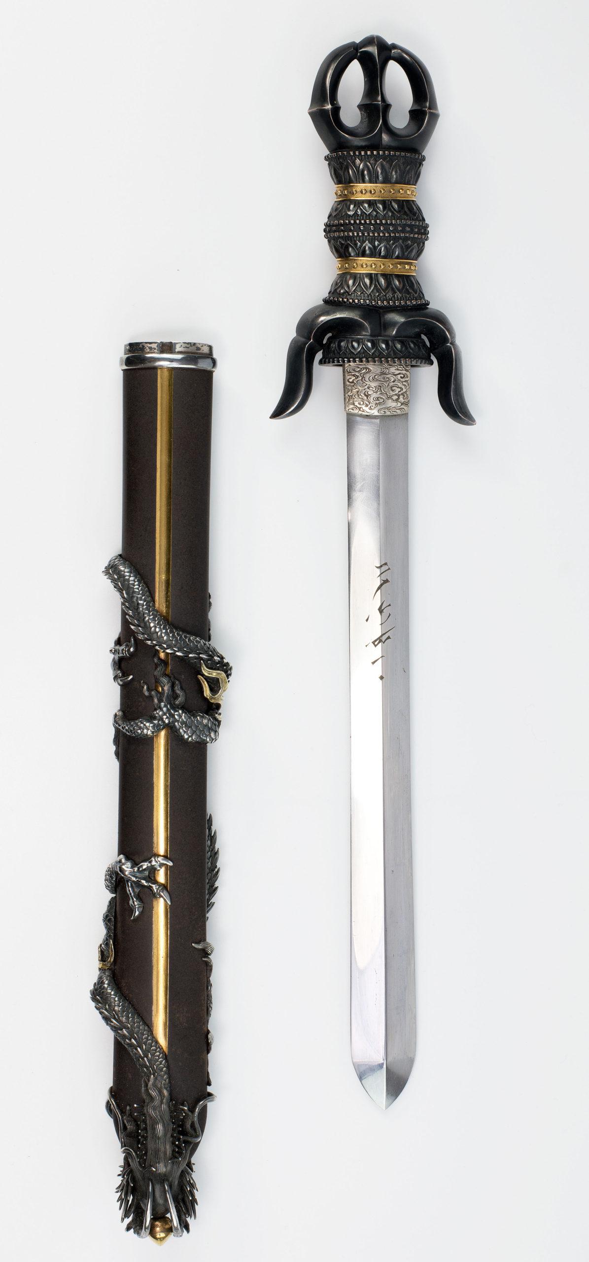 As part of our Japanese works of art collection we are delighted to offer this exceptionally fine Meiji period 1868-1912 mixed metal mounted aikuchi Tanto, the iron scabbard mounted with an entwined silver dragon of exceptional quality, adorned with