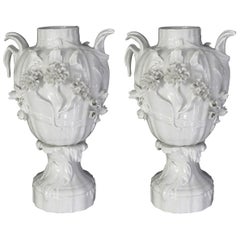 Finely Rendered Pair of French Rococo Style Blanc-de-chine Urns or Vases