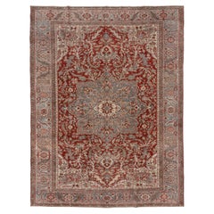 Grand tapis persan ancien Heriz finement tissé, champ extérieur rouge, médaillon unique