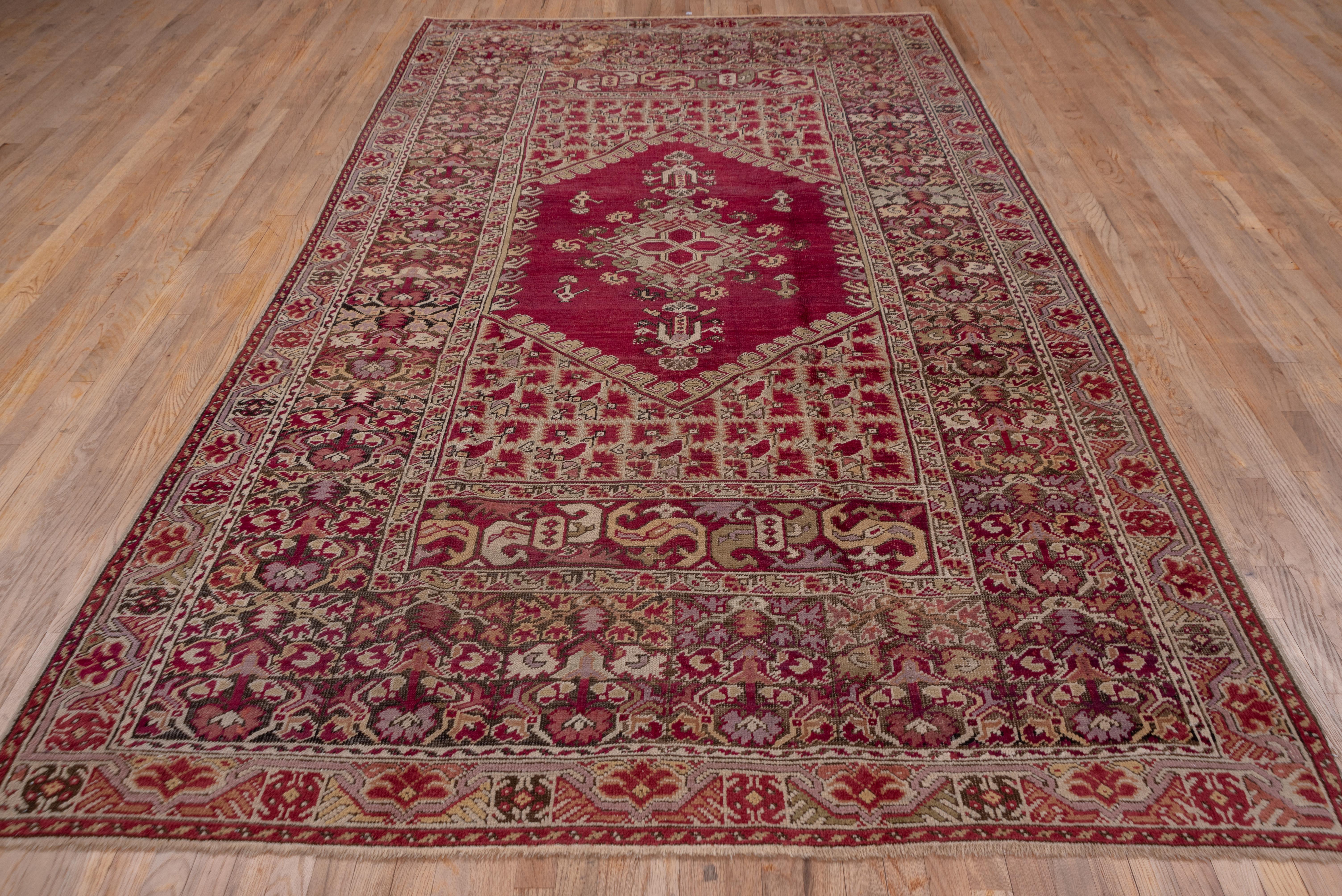 Hand-Knotted Finely Woven Antique Turkish Ghiordes Rug, Ruby Red Field, circa 1900s For Sale