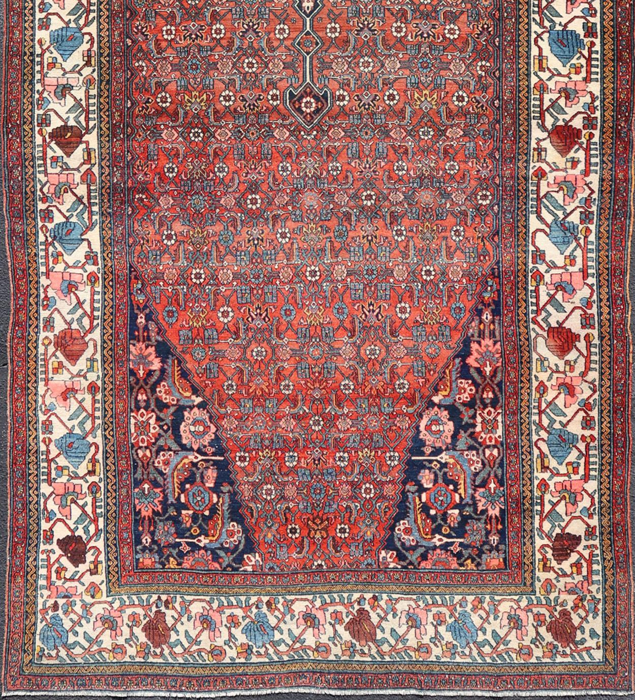 Finely woven sub geometric pattern Bibikabad antique Persian large gallery runner rug in rich blue, brick red and multi colors, rug R20-0902, country of origin / type: Iran / Bibikabad, circa 1920.

This spectacular antique Persian Khorasan carpet