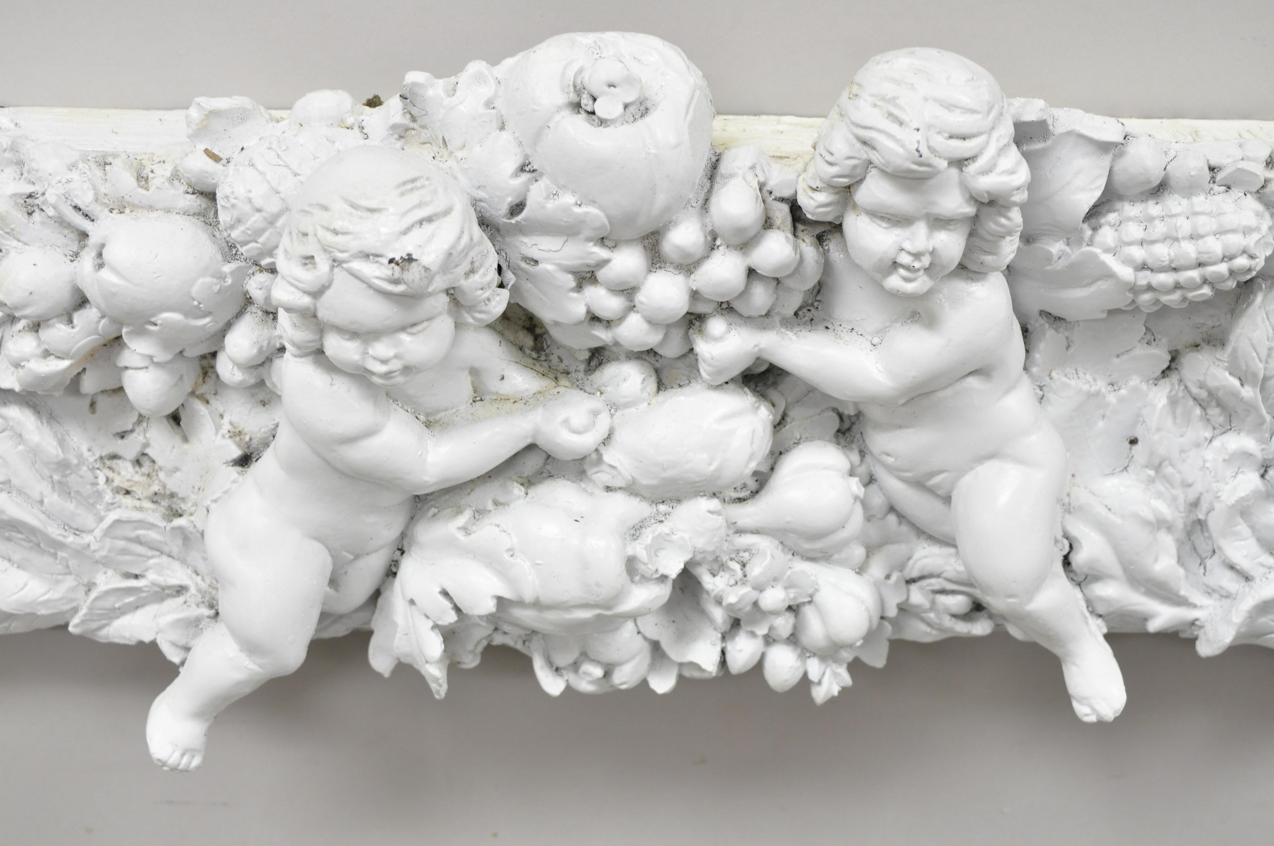 Finesse Original Rococo figural cherub grapevine large fiberglass art frame. Item features multiple cherub angels surrounding frame, flowers and leaves, fruit and vines, frame made of molded cast fiberglass, very nice vintage item, great style and