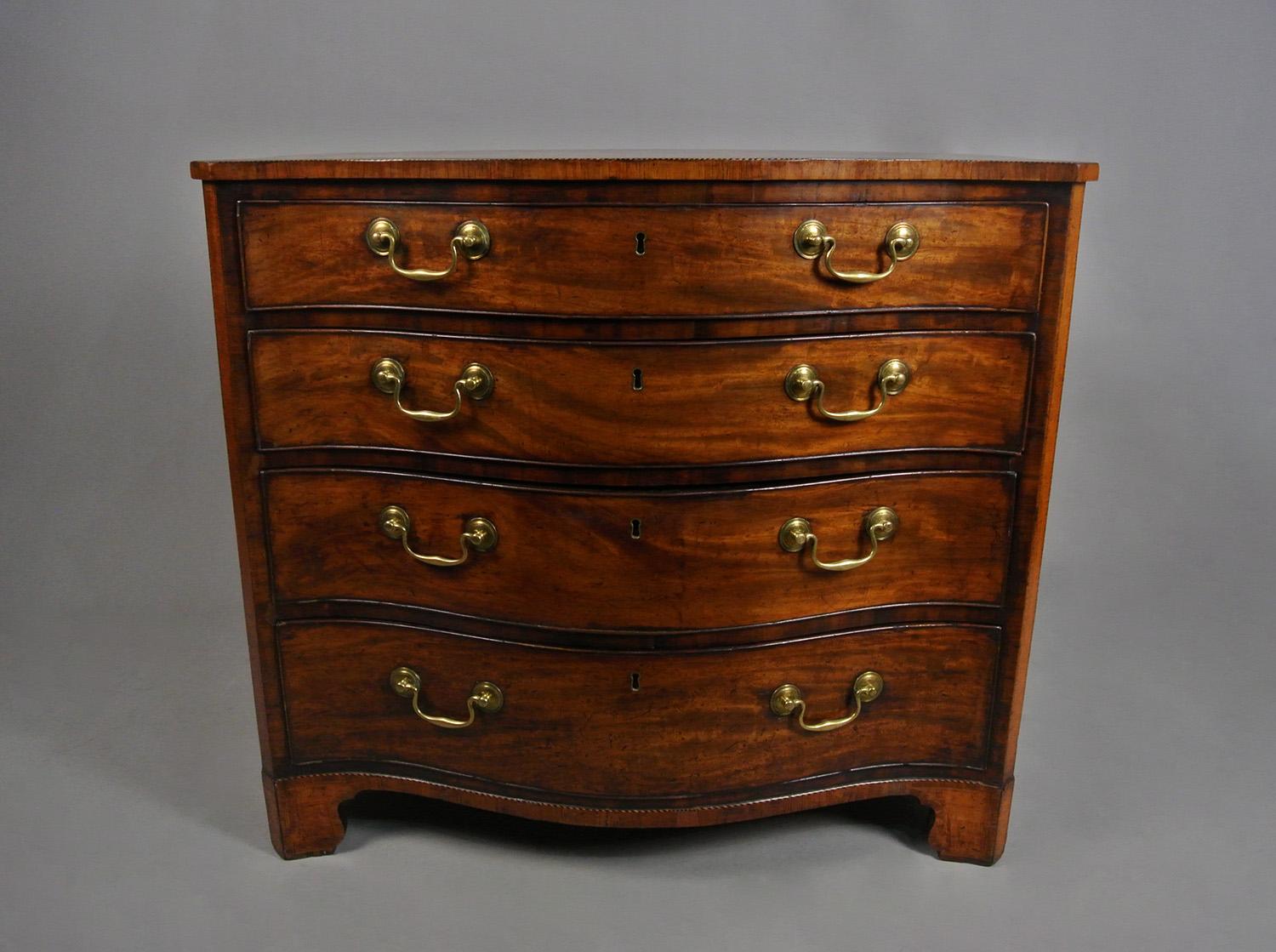 Of exceptional refinement and quality, this beautiful small serpentine chest carries all of the hallmarks of a superb maker and dates from c. 1770.   

With a fantastic natural and well developed colour and deep patina throughout.  The single board