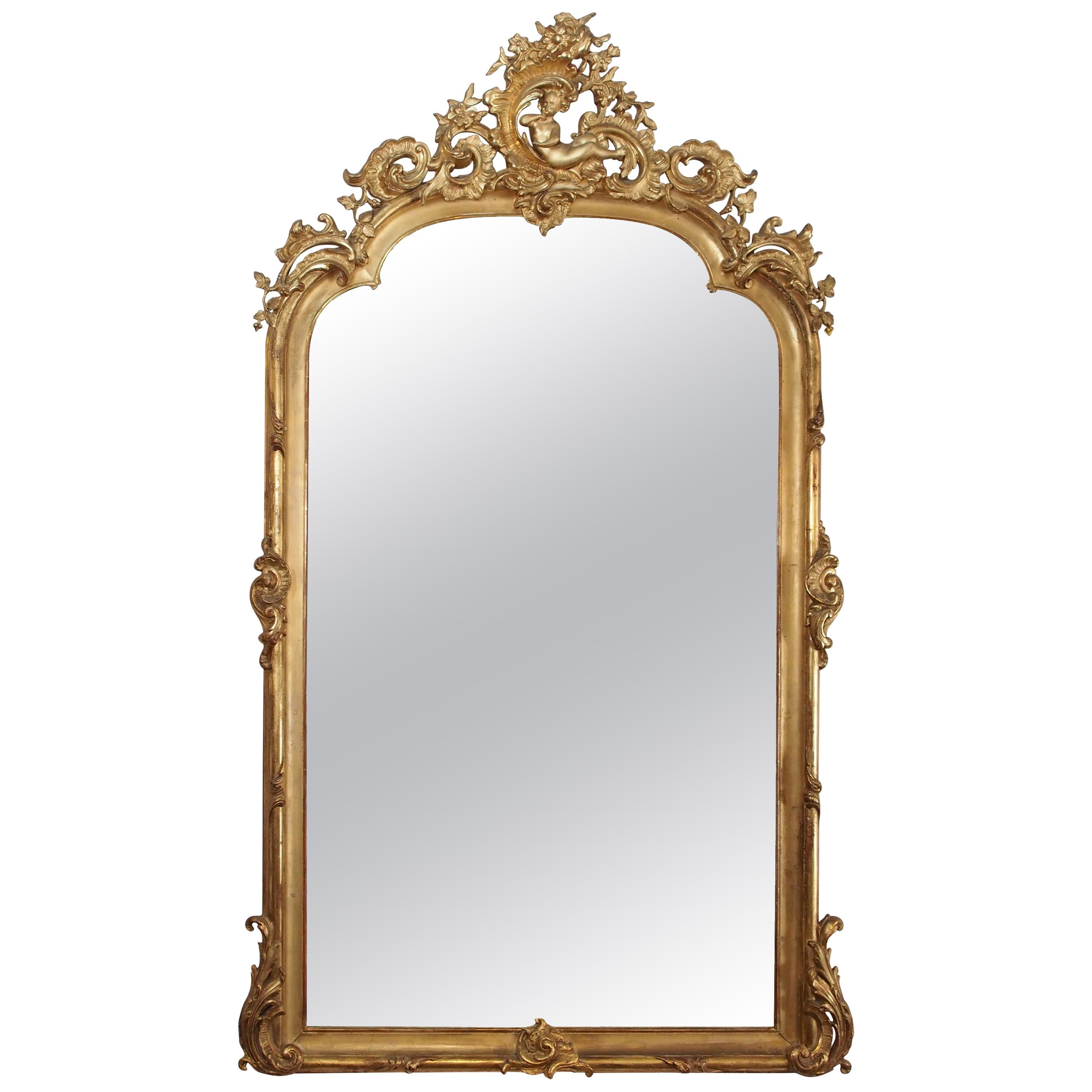 Finest Quality Antique French Gold Leaf Mirror with Beveled Glass, Cherub