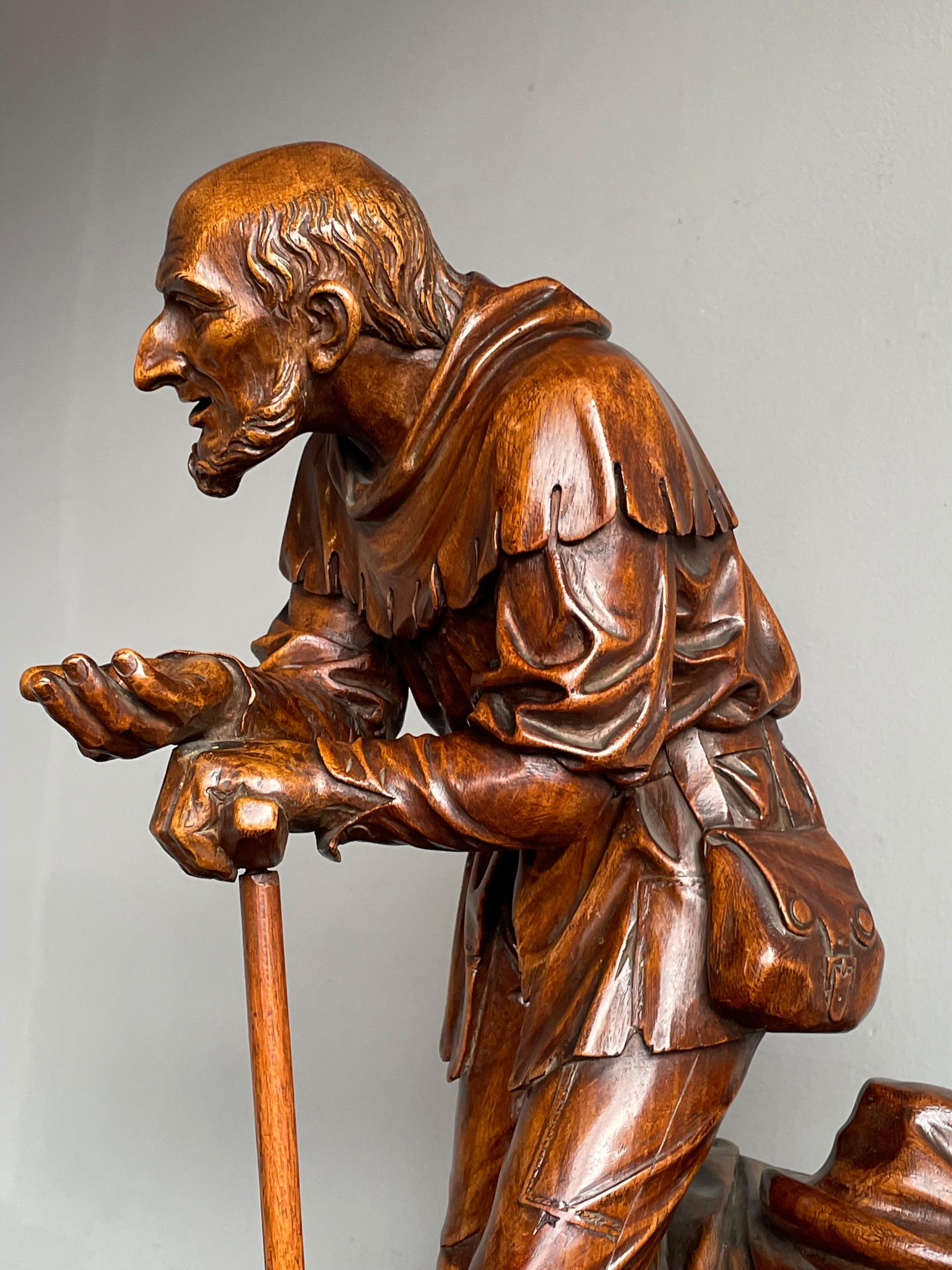 Finest Quality, Antique Hand Carved Nutwood Swiss Black Forest Beggar Sculpture For Sale 11