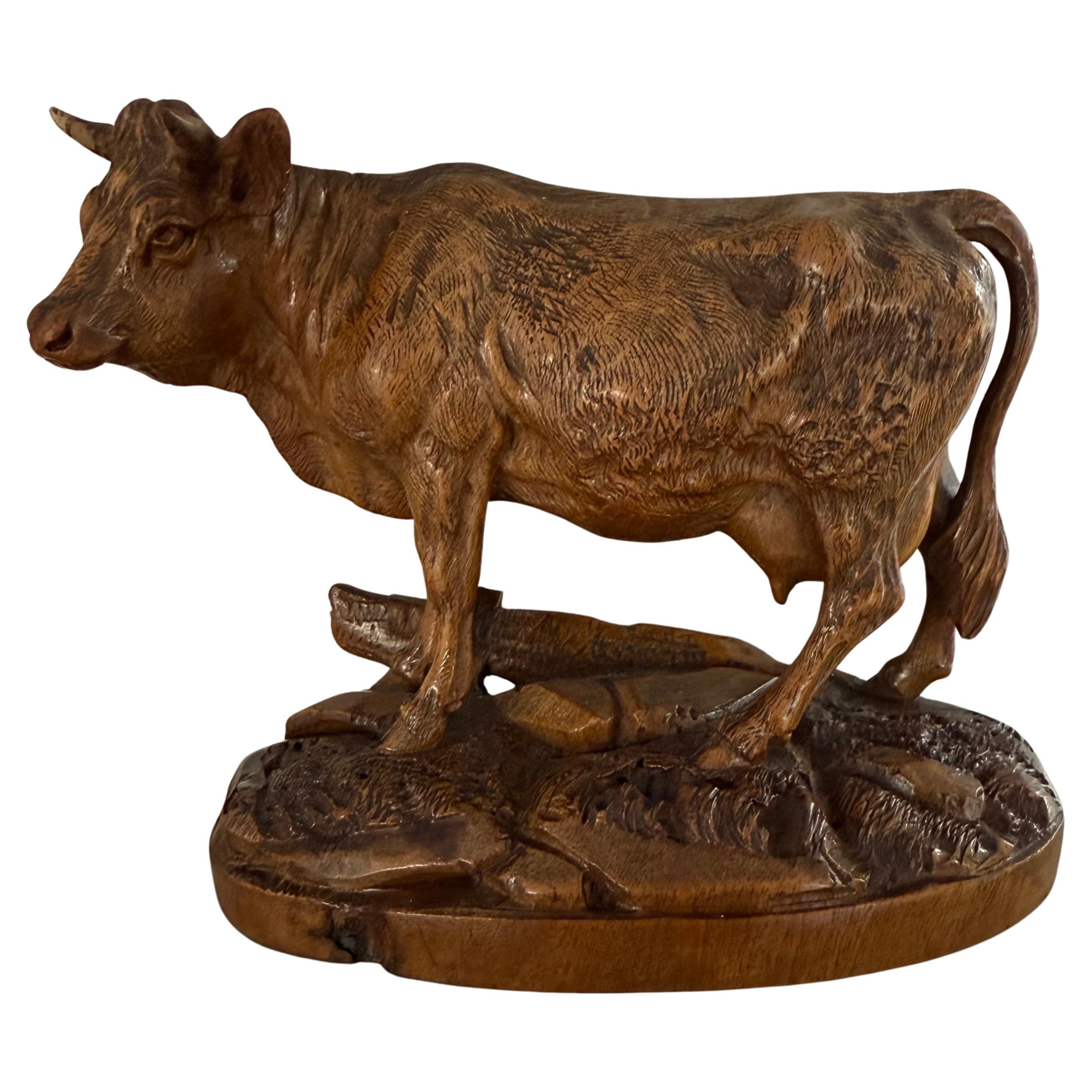 Finest Quality, Antique Hand Carved Nutwood Swiss Black Forest Cow Sculpture For Sale