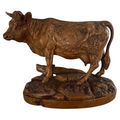 Finest Quality, Antique Hand Carved Nutwood Swiss Black Forest Cow Sculpture