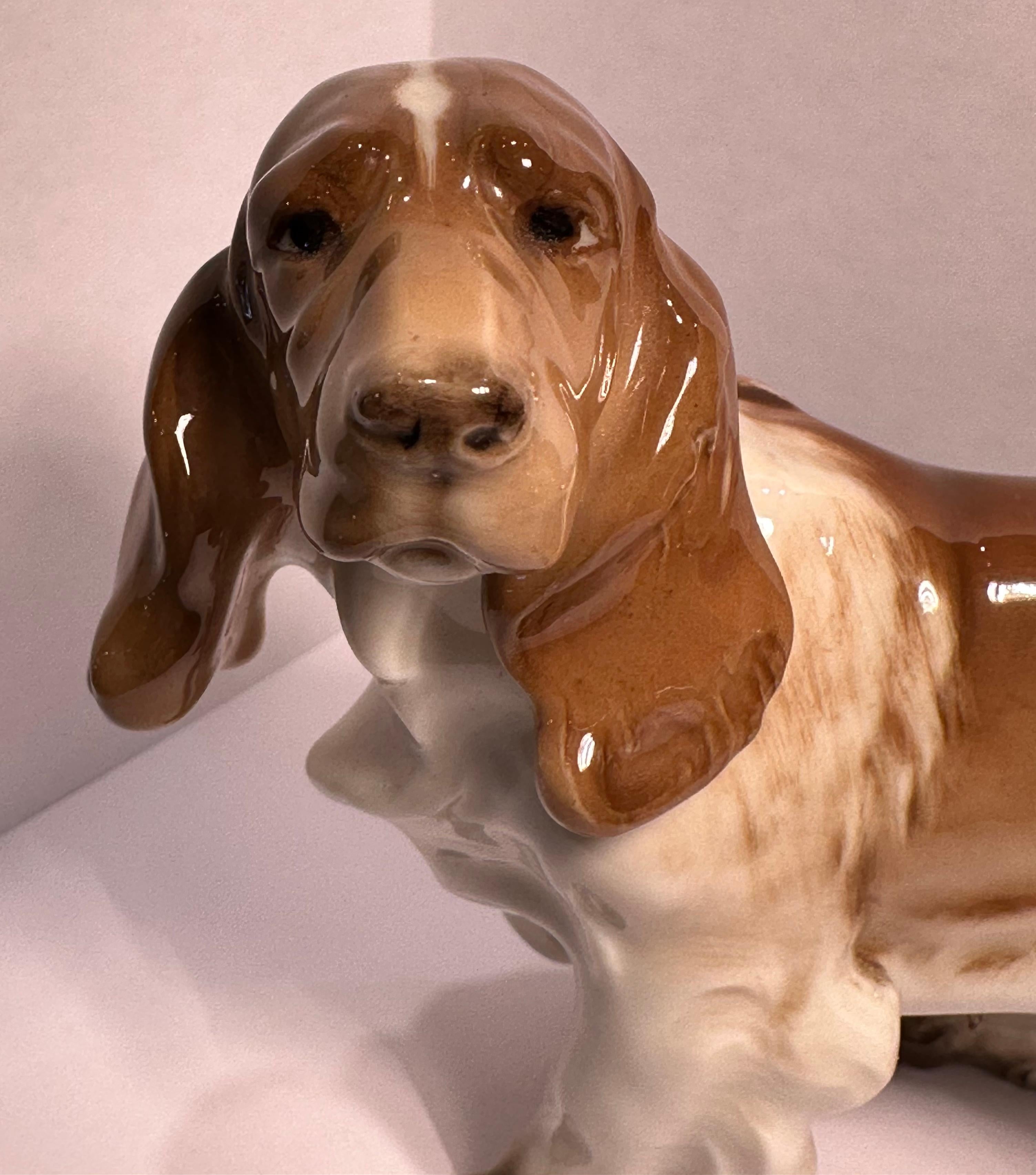 Vintage hand made and hand painted in Germany retired Hutschenreuther porcelain Cocker Spaniel dog figurine. 

Wonderful life-like detailing, poised perfectly with realistic coloring and high glaze finish. It is stamped with the Hutschenreuther logo