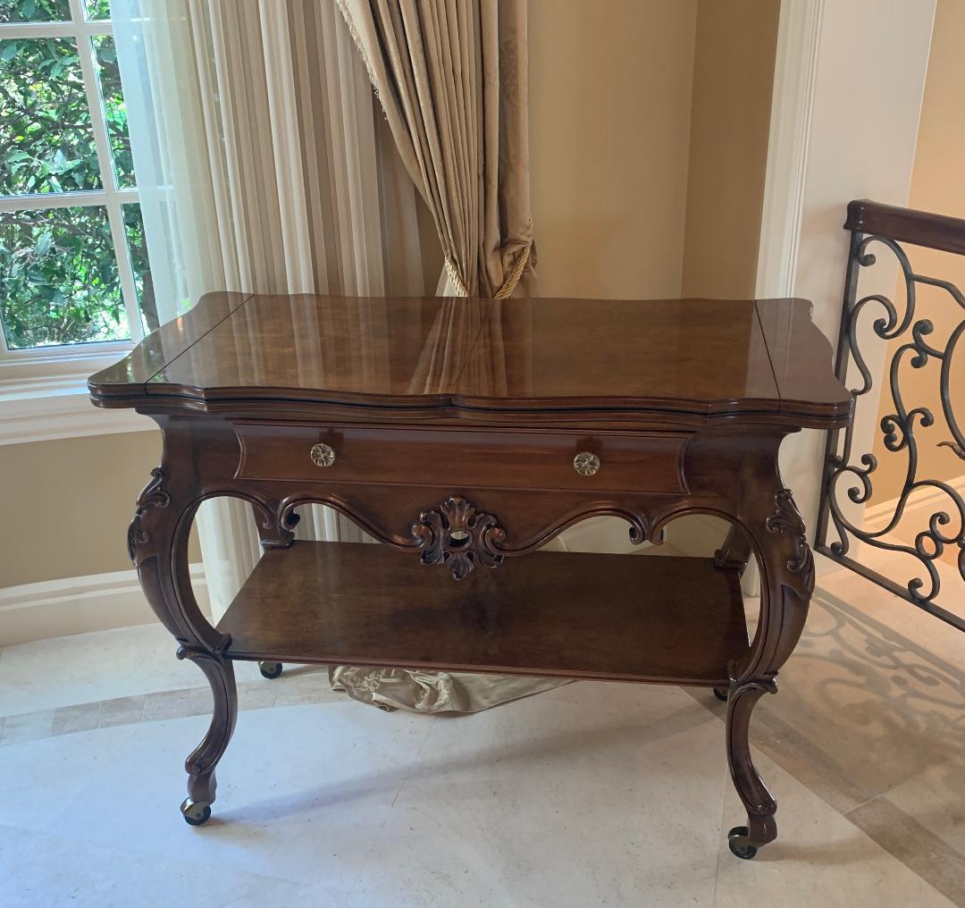 Suggested retail price new of the Karges Louis XV style walnut Venetian server model 667 is $22,221.00. Our price is $3800.00.

Finest quality Karges server is handmade and hand carved out of walnut. This timeless design is functional while