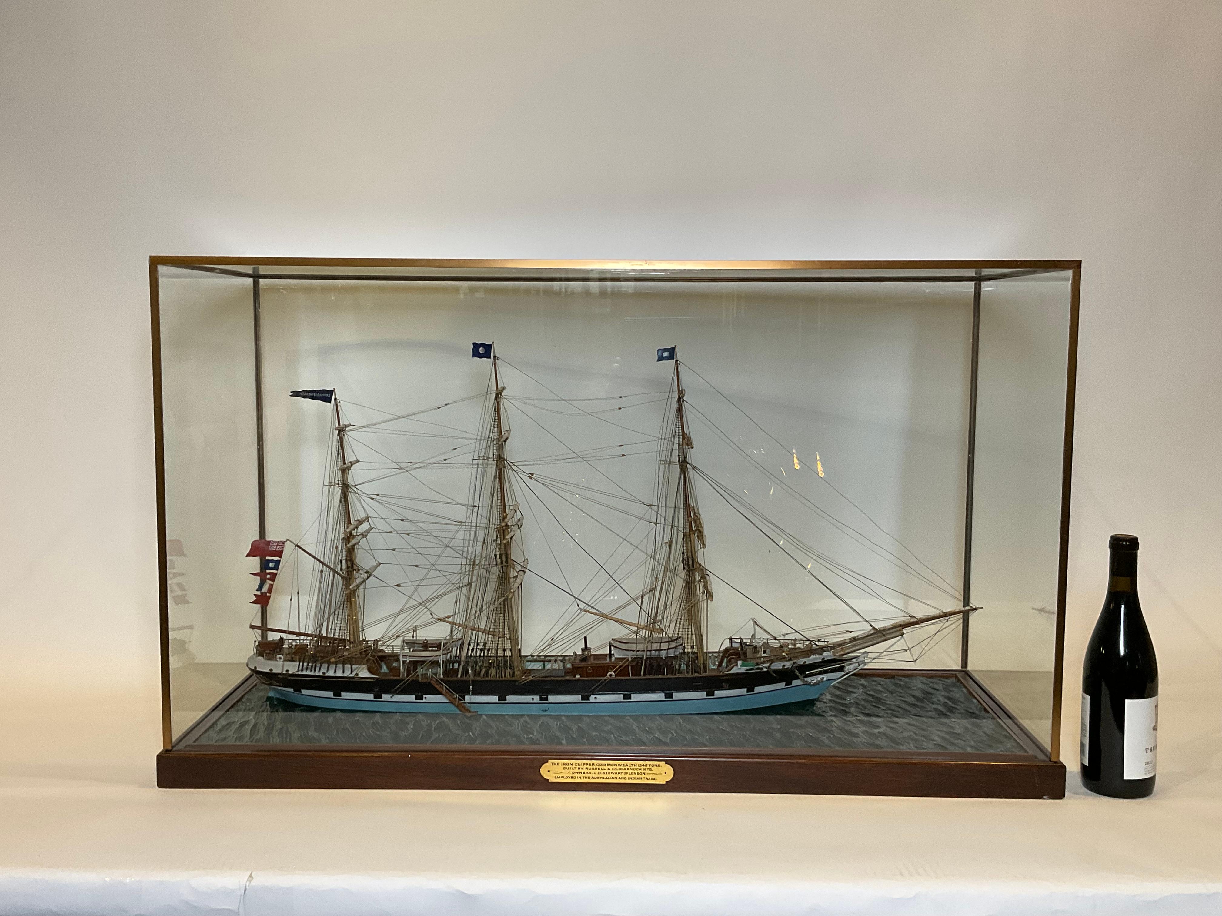 Exceptional model of the iron clipper Commonwealth. The ship was built by Russel and Co., Greenock, 1876, owner C.H. Stewart of London. Employed in the Australian and Indian trade. The model is highly detailed with figurehead, capstan, link chain,