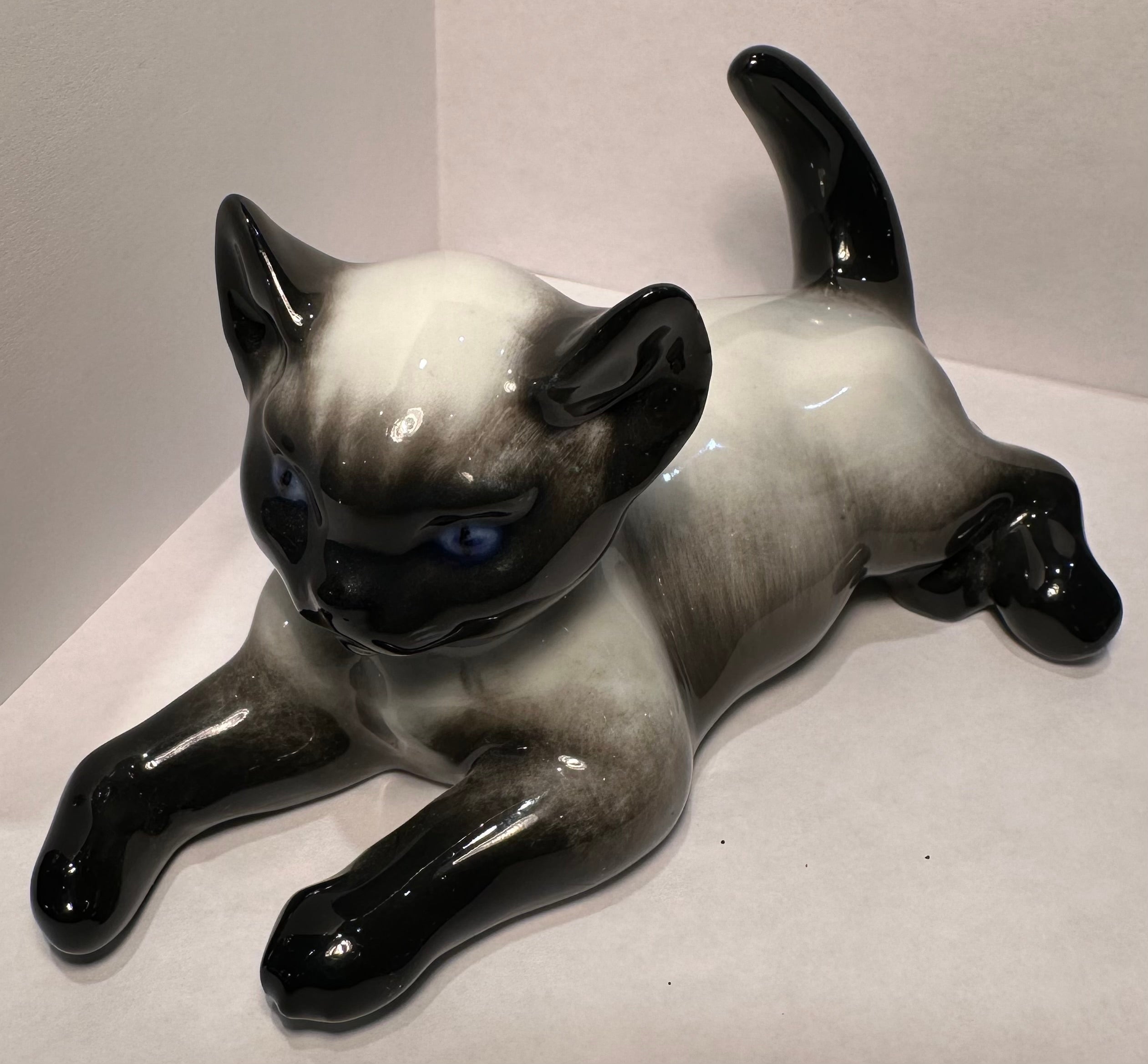
Finest quality, vintage retired, handmade and hand painted in Germany, Rosenthal porcelain Siamese kitten or cat figurine designed by well known deceased German artist, Fritz Heidenreich (1895-1966). The cat has been masterfully handmade and hand