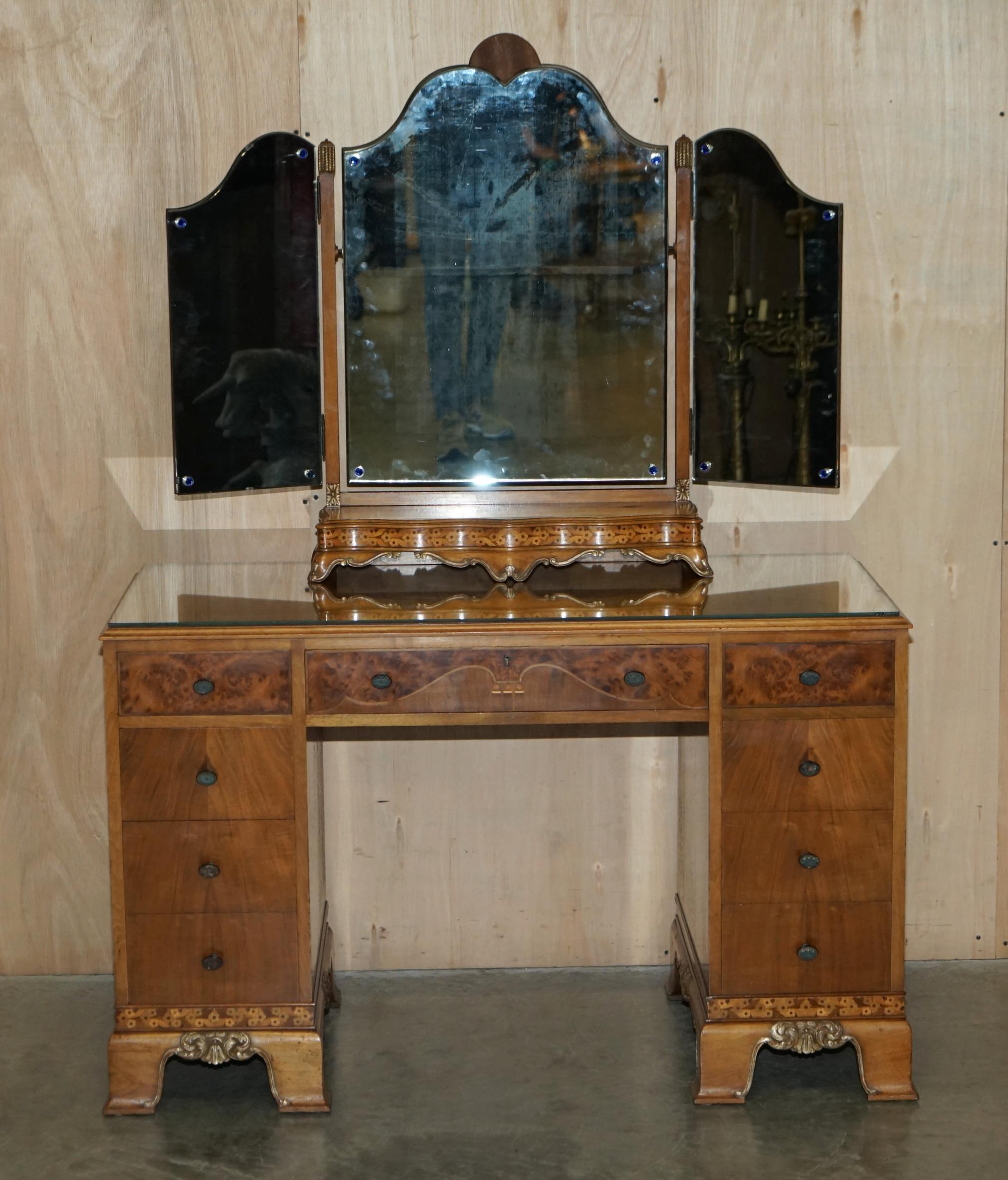We are delighted to offer for sale this finest quality Waring & Gillow Lancaster, Burr Walnut inlaid Dressing table with tri folding mirrors which is part of a suite

This piece is part of a bedroom set, I have in total a triple bank wardrobe,