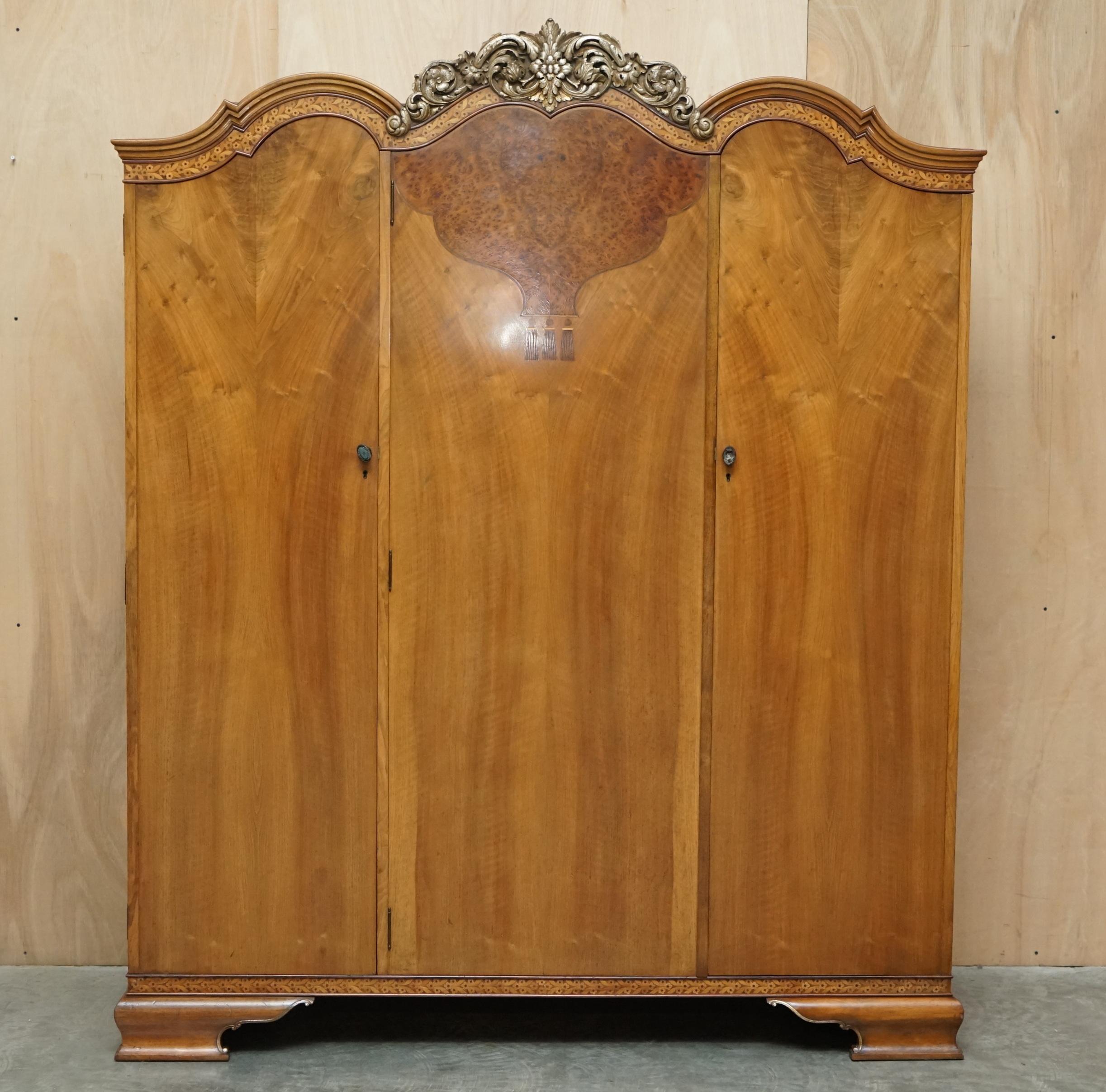 We are delighted to offer for sale this finest quality Waring & Gillow Lancaster, burr walnut inlaid wardrobe which is part of a suite.

This piece is part of a bedroom set, I have in total a triple bank wardrobe, dressing table with trifold