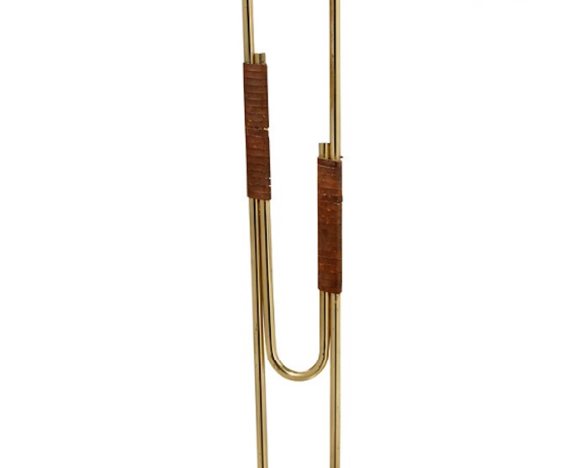 A mid-20th century floor lamp model EN 31 for Itsu, Finland

Polished brass. Adjustable stems with leather windings. Manufacturer stamp.