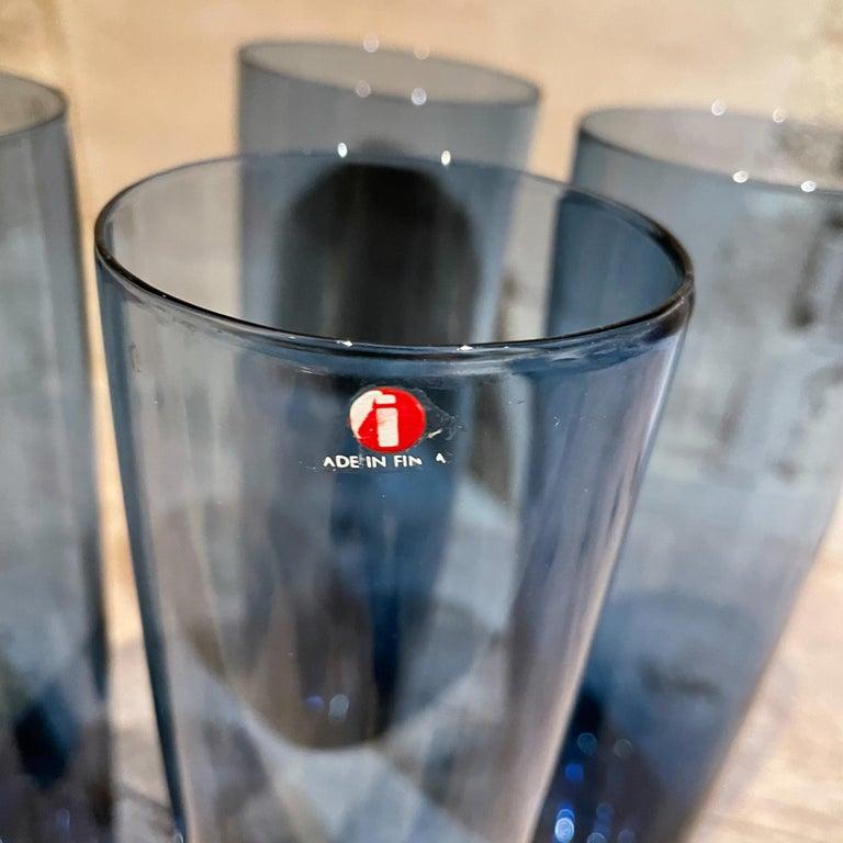 Modern Set of four tall narrow tumbler glasses in blue made in Finland by Iittala.
Designer Kaj Franck
Scandinavian Art Glass
One glass retains label. Preowned and in good condition.
7 t x 2.5 diameter inches
Refer to images please.
 