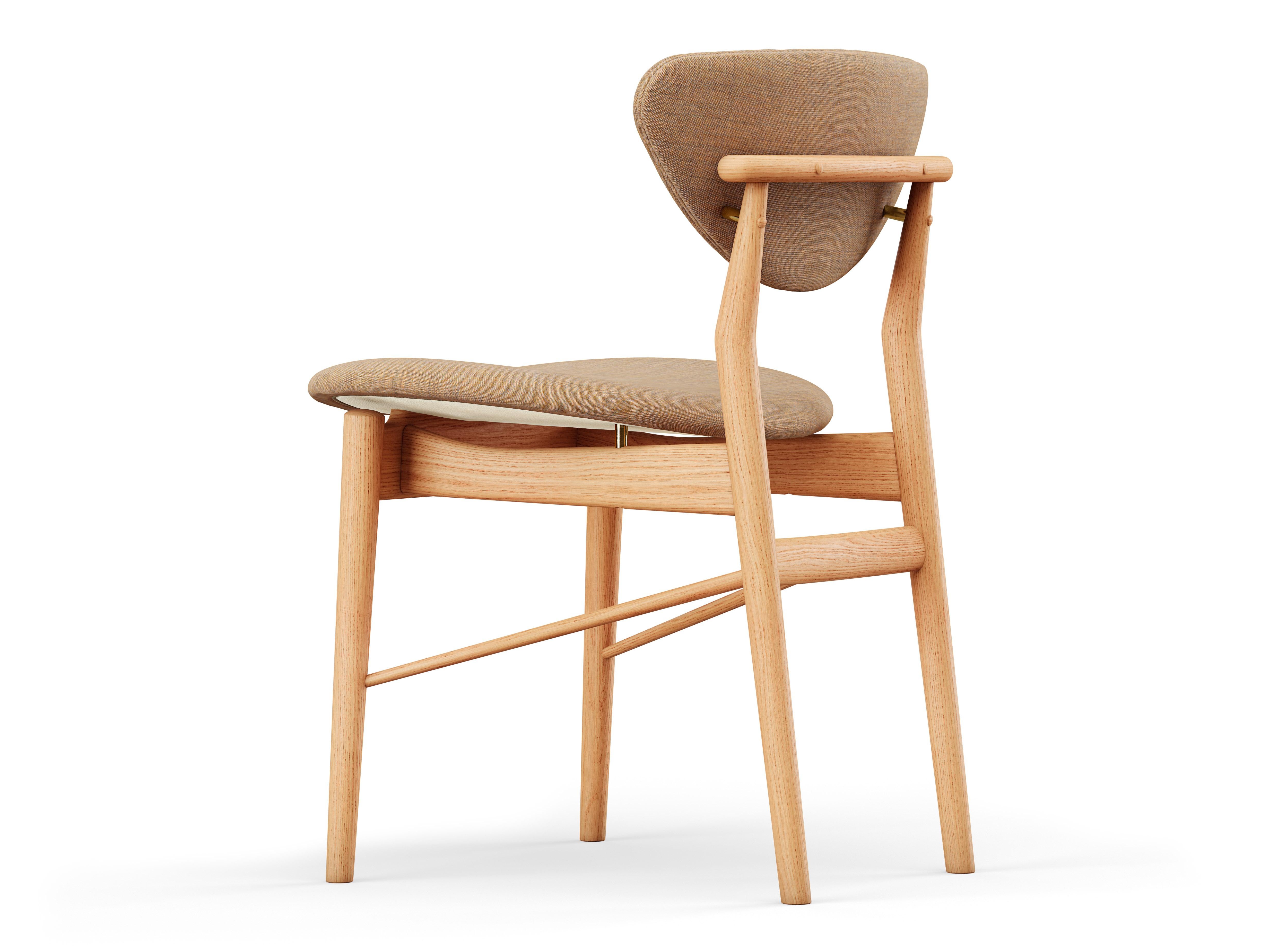 Chair designed by Finn Juhl in 1946, relaunched in 208.
Manufactured by House of Finn Juhl in Denmark.

To this day, Finn Juhl's designs are unconventional and defy expectations with subtle details. Finn Juhl himself once said that the deviation