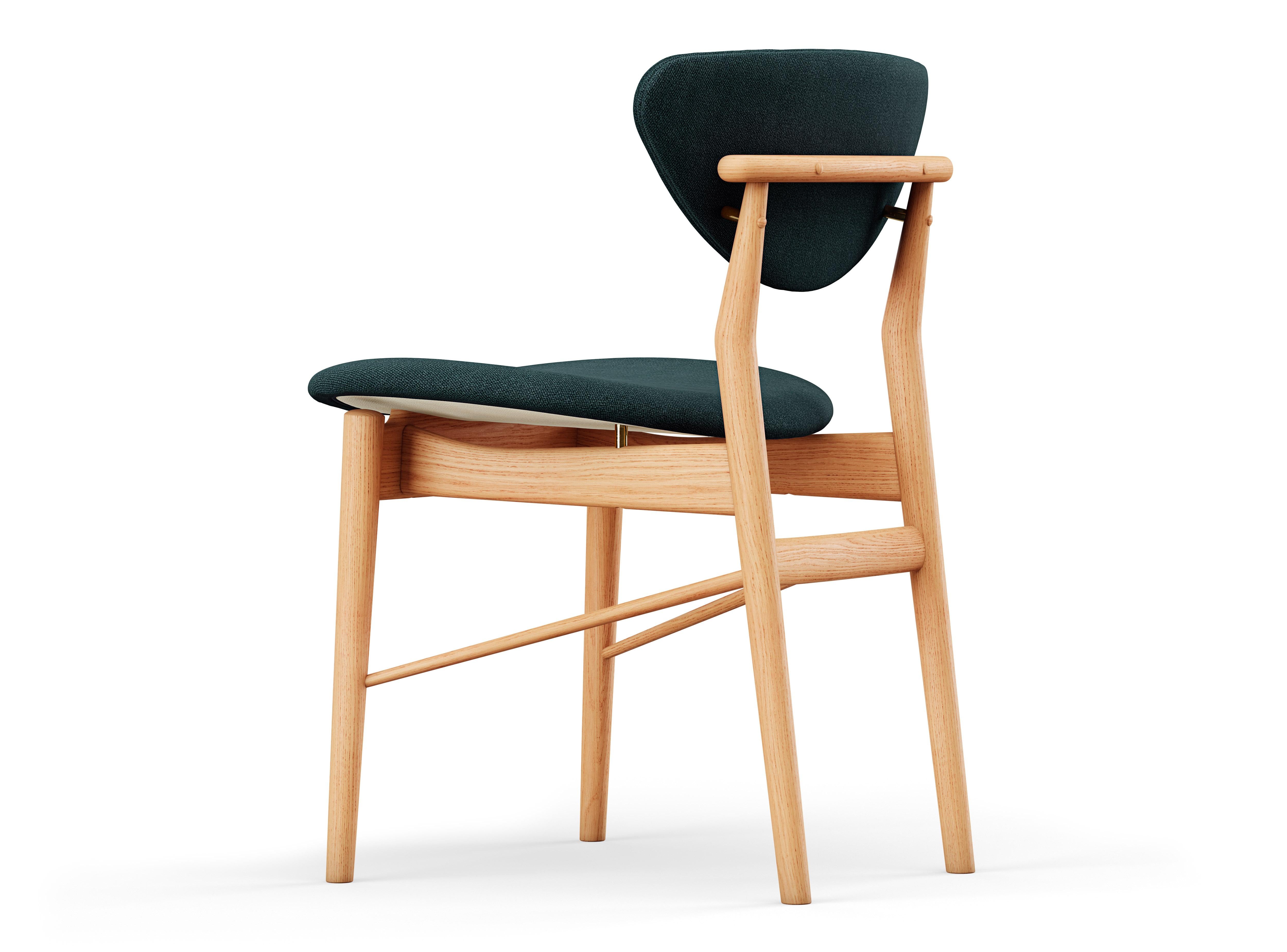 Chair designed by Finn Juhl in 1946, relaunched in 208.
Manufactured by House of Finn Juhl in Denmark.

To this day, Finn Juhl's designs are unconventional and defy expectations with subtle details. Finn Juhl himself once said that the deviation