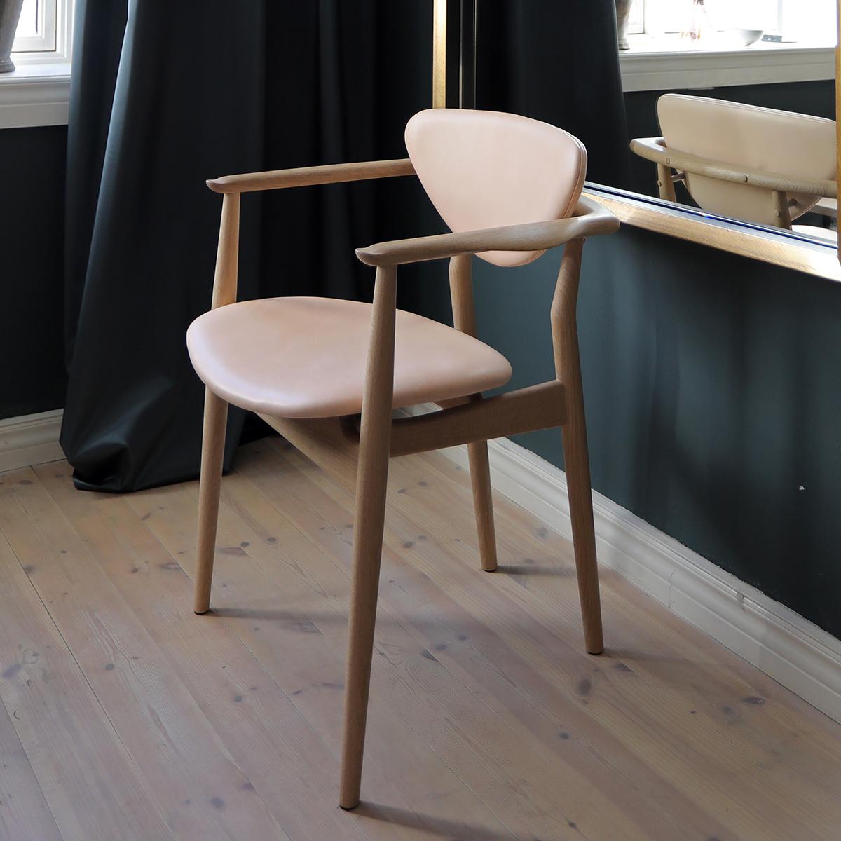 Chair designed by Finn Juhl in 1946, relaunched in 2009.
Manufactured by House of Finn Juhl in Denmark.

The 109 Chair was originally manufactured by cabinetmaker Niels Vodder, just like its close relative the 108 Chair. In this design, it is in
