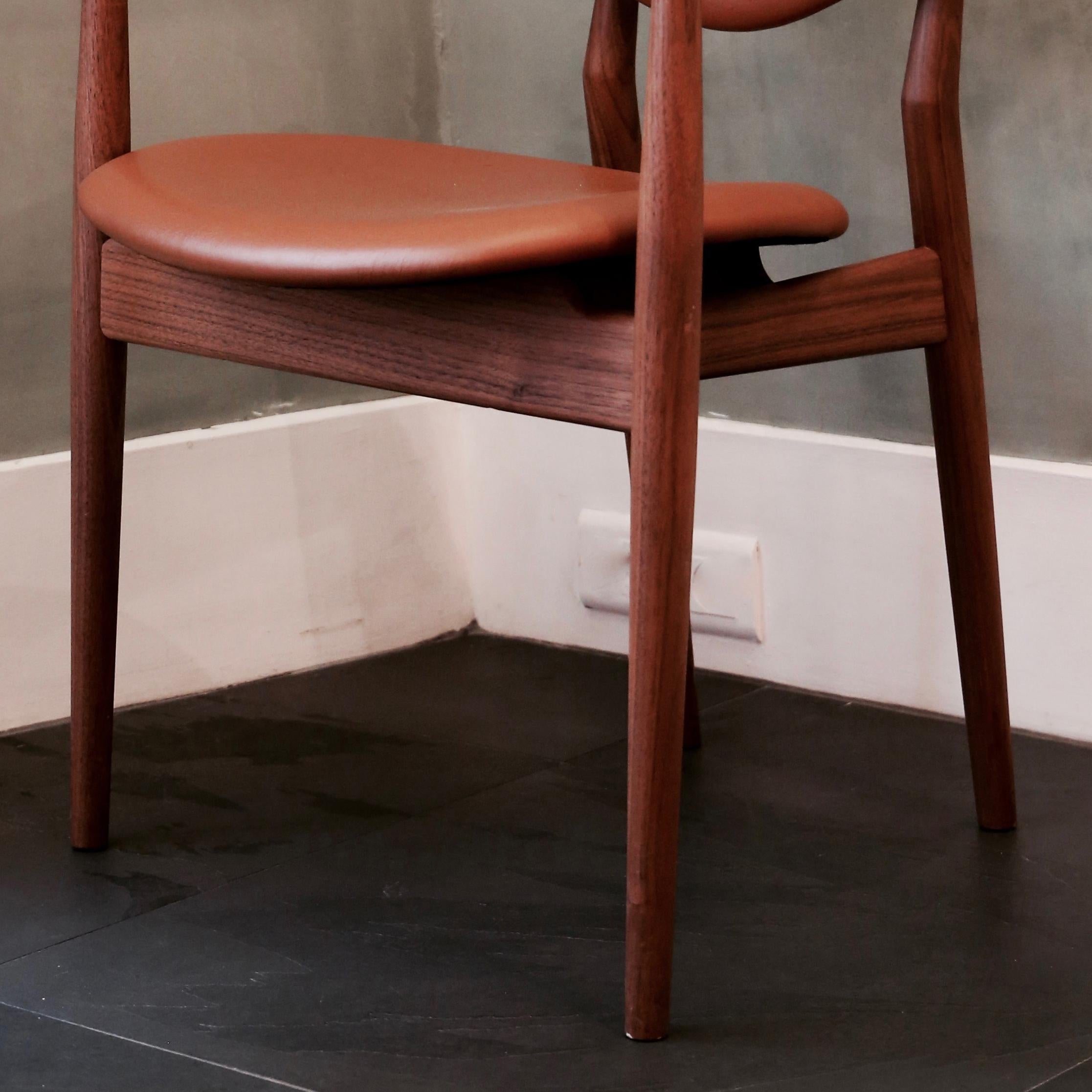 Chair designed by Finn Juhl in 1946, relaunched in 2009.
Manufactured by House of Finn Juhl in Denmark.

The 109 Chair was originally manufactured by cabinetmaker Niels Vodder, just like its close relative the 108 Chair. In this design, it is in
