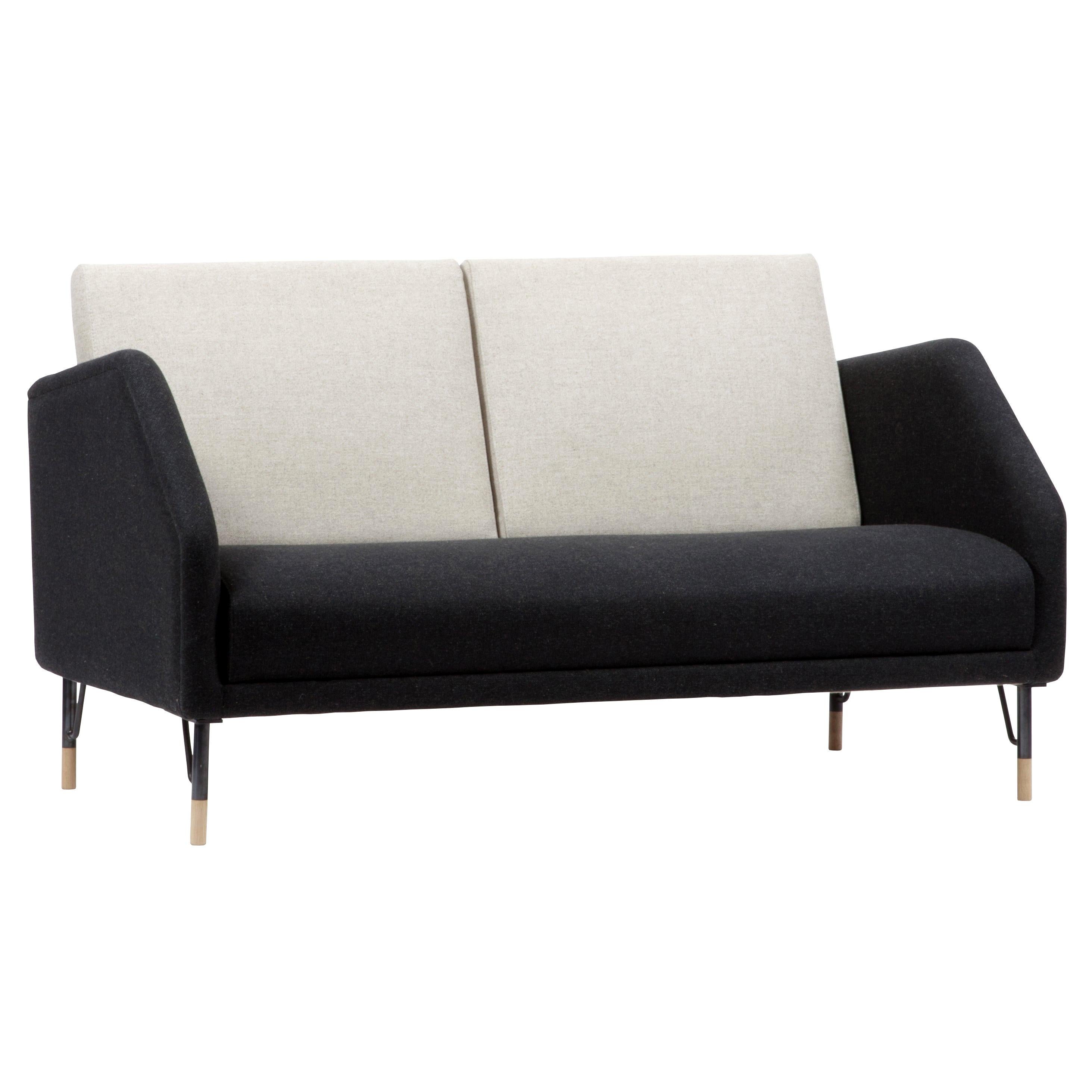 Sofa designed by Finn Juhl in 1953, relaunched in 2012.
Manufactured by House of Finn Juhl in Denmark.

During the 1950s, Finn Juhl designed a series of furniture for the company Bovirke. This series is characterized by a streamlined, industrial