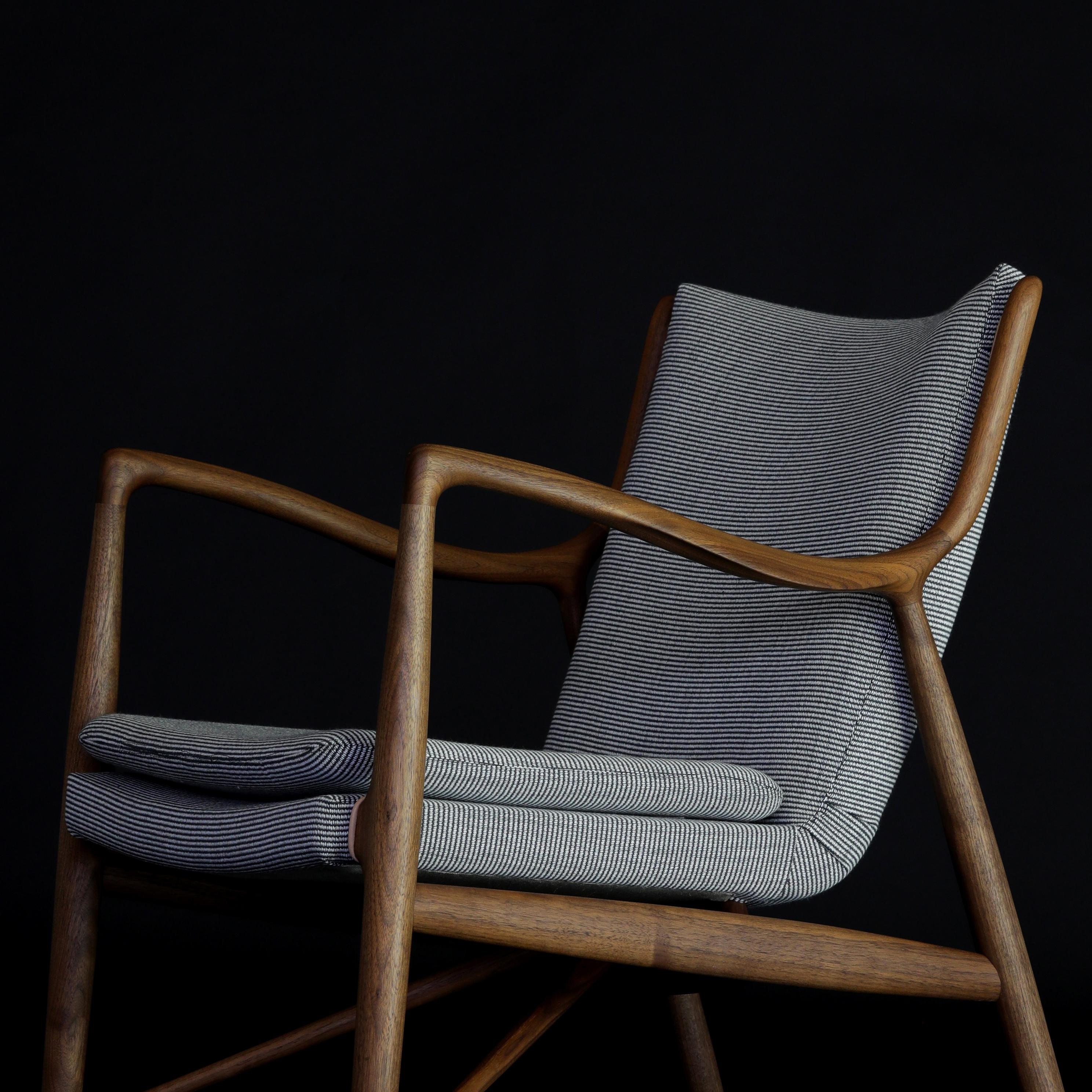 Chair designed by Finn Juhl
Manufactured by One collection Finn Juhl (Denmark)

The space between the frame and the seat creates a lightness, which, combined with its organic shape and sublime detailing, creates a unique beauty. The chair is also