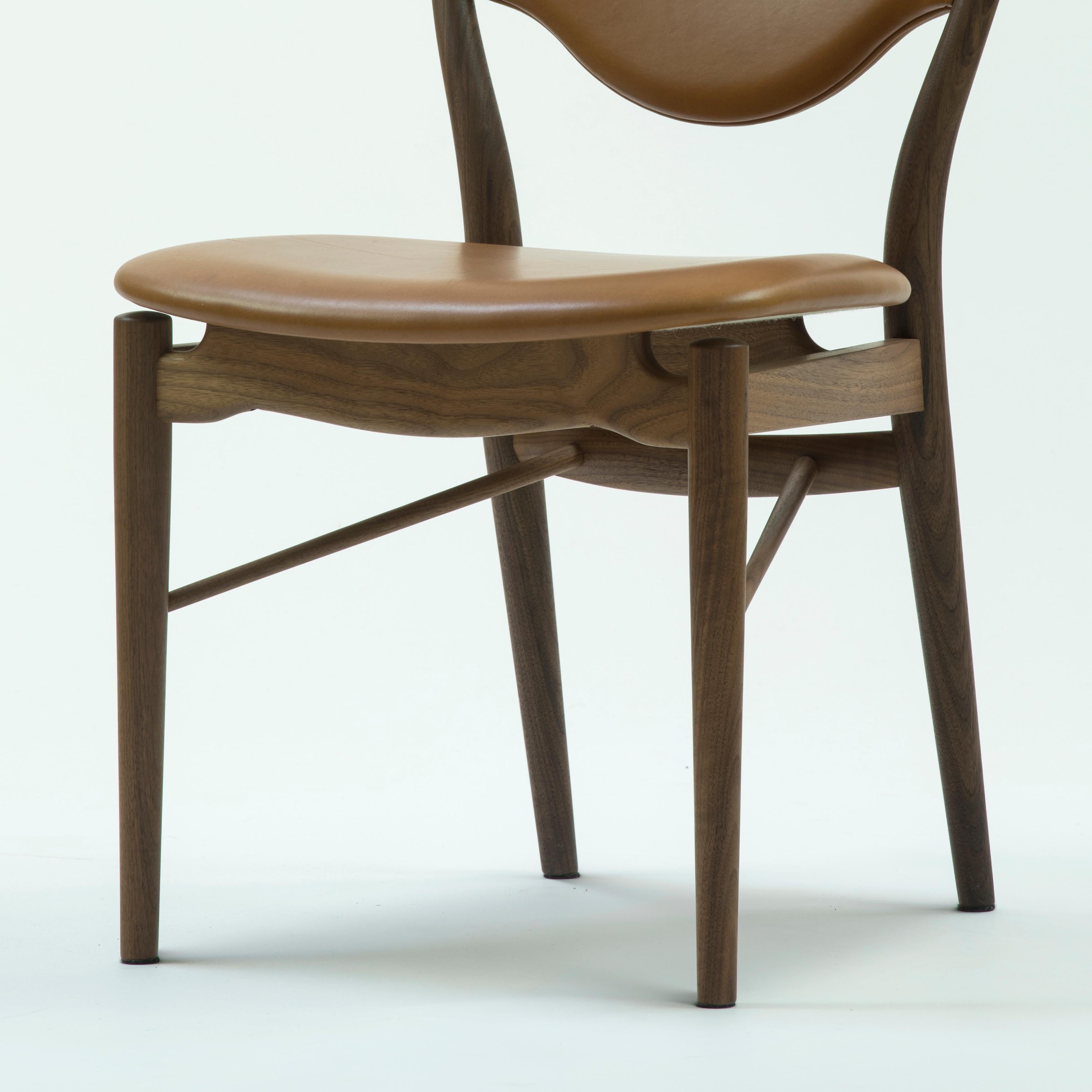 Chair designed by Finn Juhl
Manufactured by One collection Finn Juhl (Denmark)

1946, relaunched in 2018

Dimensions:
W 52cm x D 53cm x H 82cm
Seat height 44cm

Finn Juhl clearly attempted to emphasize the lightness of the chair by