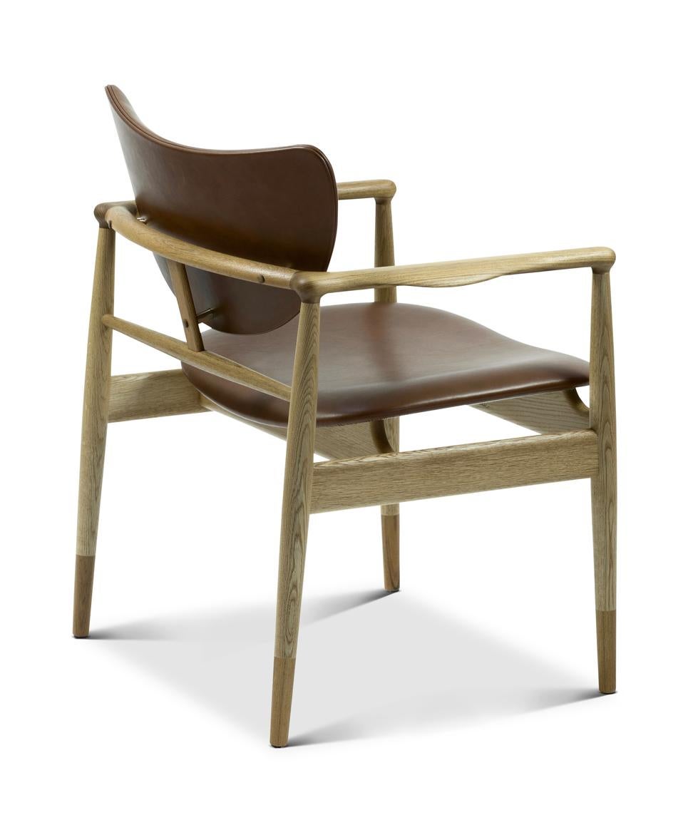 Chair designed by Finn Juhl in 1948, relaunched in 2018.
Manufactured by House of Finn Juhl in Denmark.

The 48 Chair is part of the 48 Series which was presented at the Cabinet Makers’ Guild Exhibition in 1948. Even to the modern eye it is clear