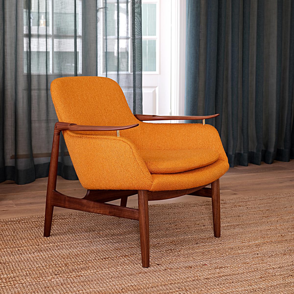 Chair designed by Finn Juhl in 1953, relaunched in 2020.
Manufactured by House of Finn Juhl in Denmark.

The FJ 53 is an extravagant piece of furniture. It integrates the lightness and elegance of a wooden chair with an upholstered corpus, to