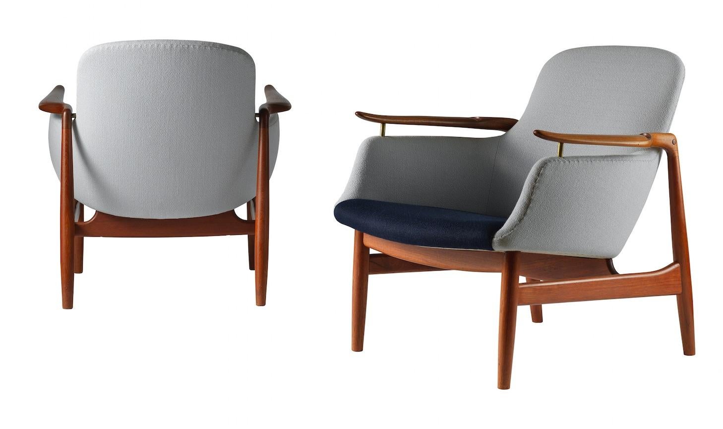 Pair of easy chairs, model no. NV 53 in solid Bangkok teak. Sides, seat and back upholstered with wool
designed 1953

Manufactured and stamped by Niels Vodder in the late 1950s

Literature:

Erik Wørts, 'Den Syvogtyvende', Dansk
