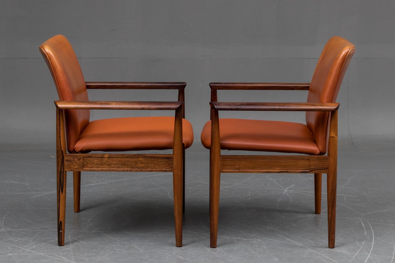 Finn Juhl, diplomat desk chair or armchair with frame in hardwood, new seat upholstery and cover, model 209. Designed in 1963. Produced by France & Son.
Measures: H. 82 cm, SH. 44 cm, B. 69 cm.
Used but still in perfect condition.
 