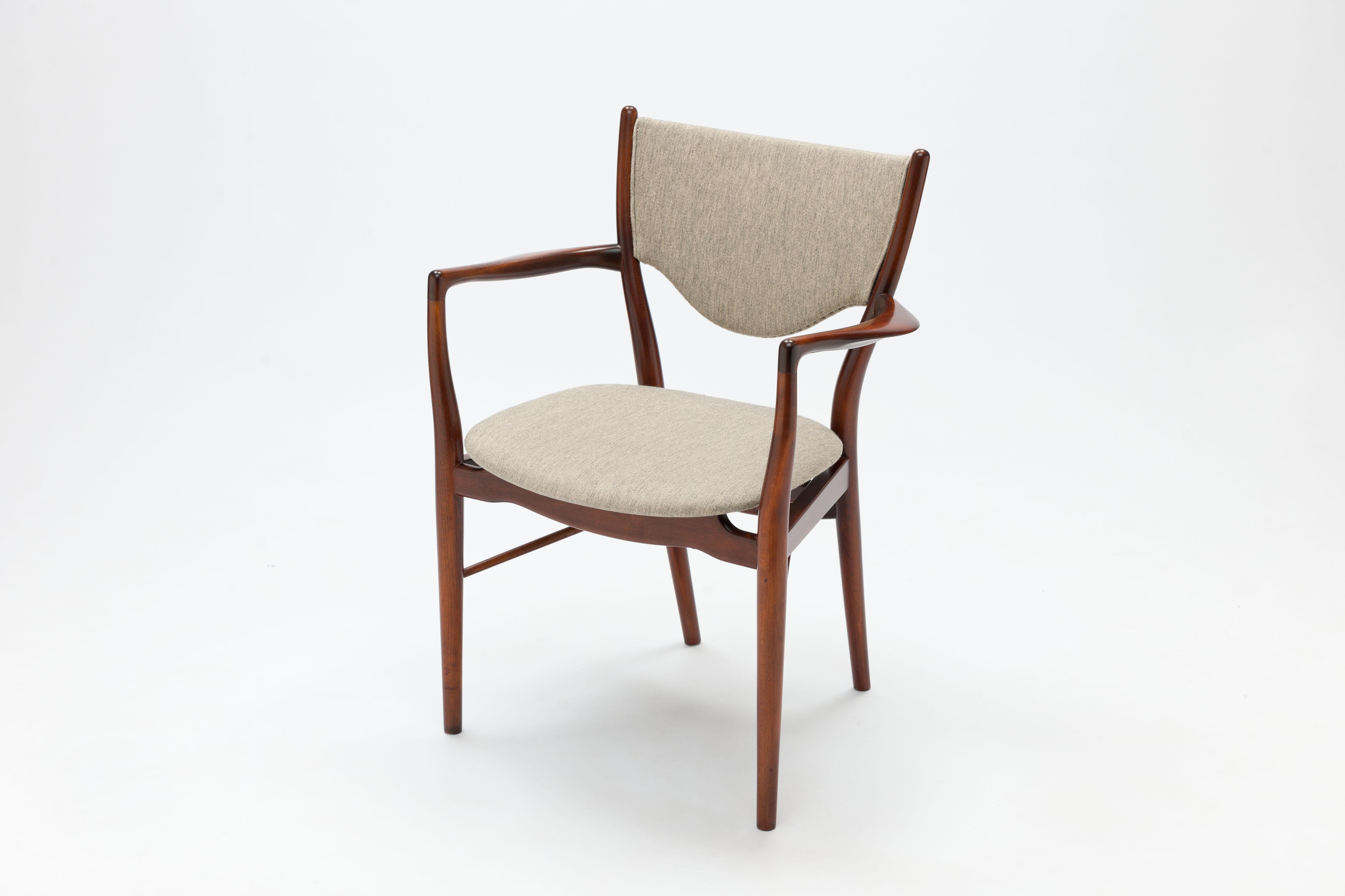 A rare and early example of armchair model BO-46 by Finn Juhl for Bovirke Denmark. Arm chair model BO-46 was designed by Finn Juhl in 1953 based upon his earlier designed chair model NV46 by Niels Vodder. 

Frame of stained beech with very good