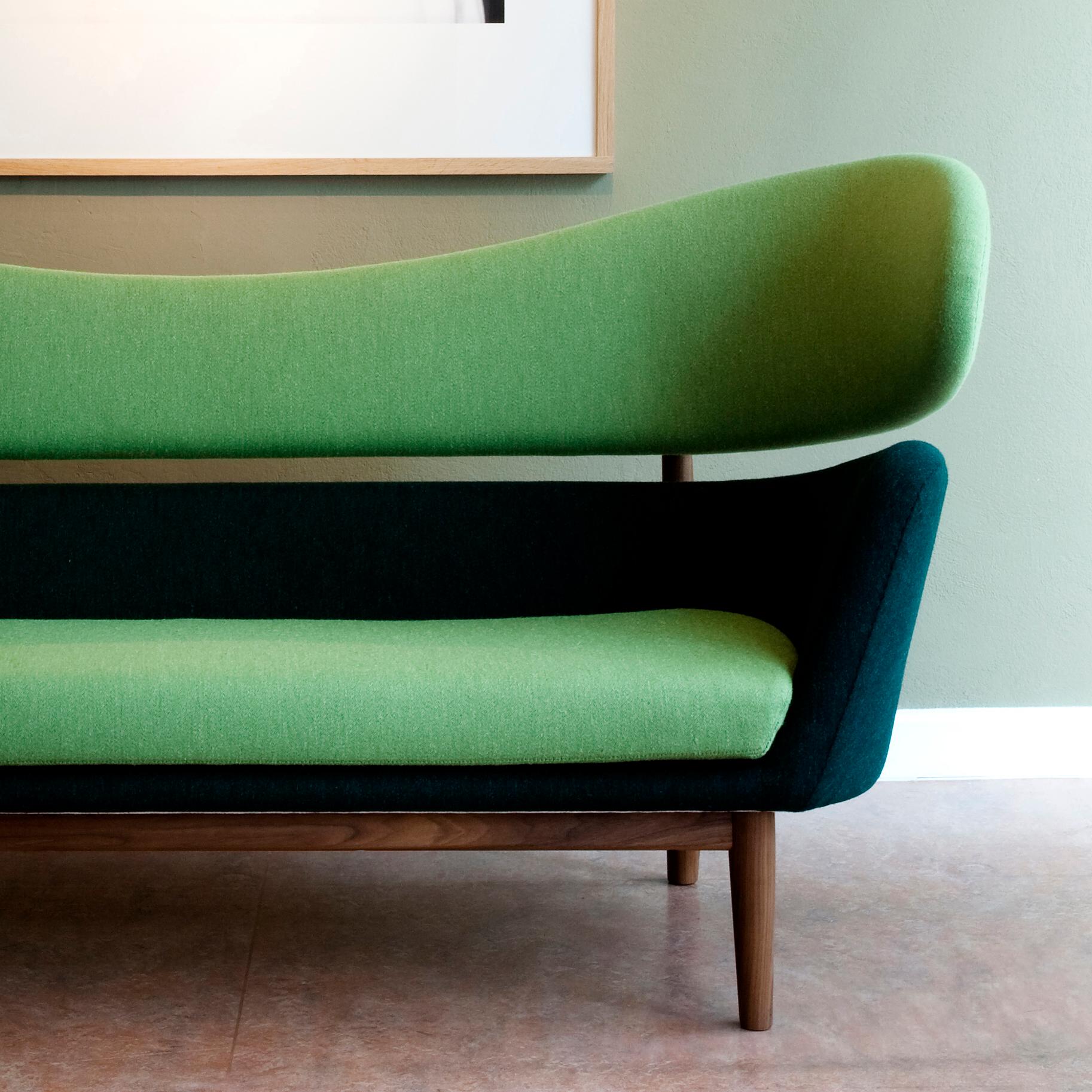 Sofa designed by Finn Juhl in 1951, relaunched in 2009.
Manufactured by House of Finn Juhl in Denmark.

Edgar Kaufmann Jr., a prolific art collector and director of the Industrial Design Department at the Museum of Modern Art in New York,