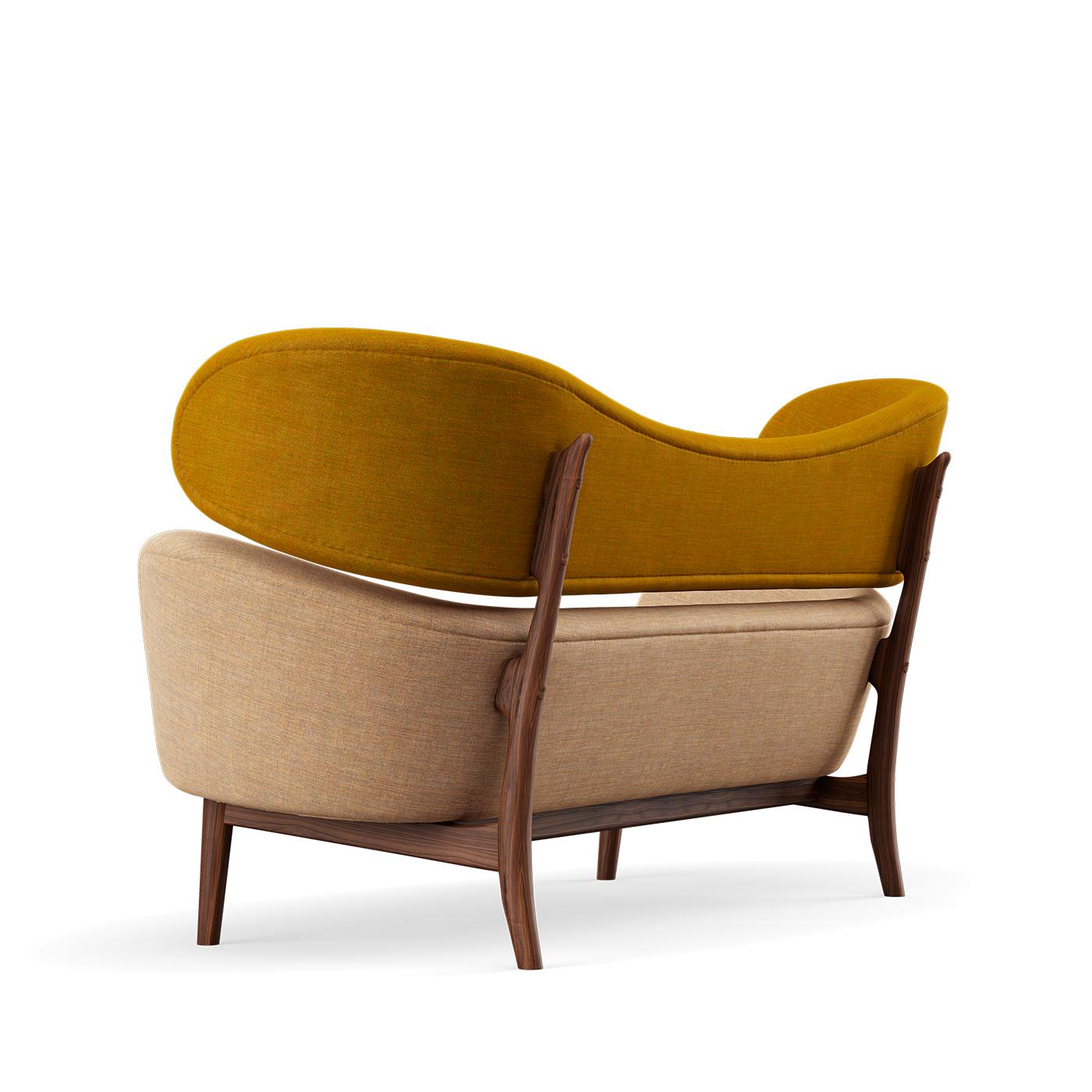 Sofa designed by Finn Juhl in 1951, relaunched in 2009.
Manufactured by House of Finn Juhl in Denmark.

Walnut wood upholstered with Remix 412-242 fabrics.

Edgar Kaufmann Jr., a prolific art collector and director of the Industrial Design