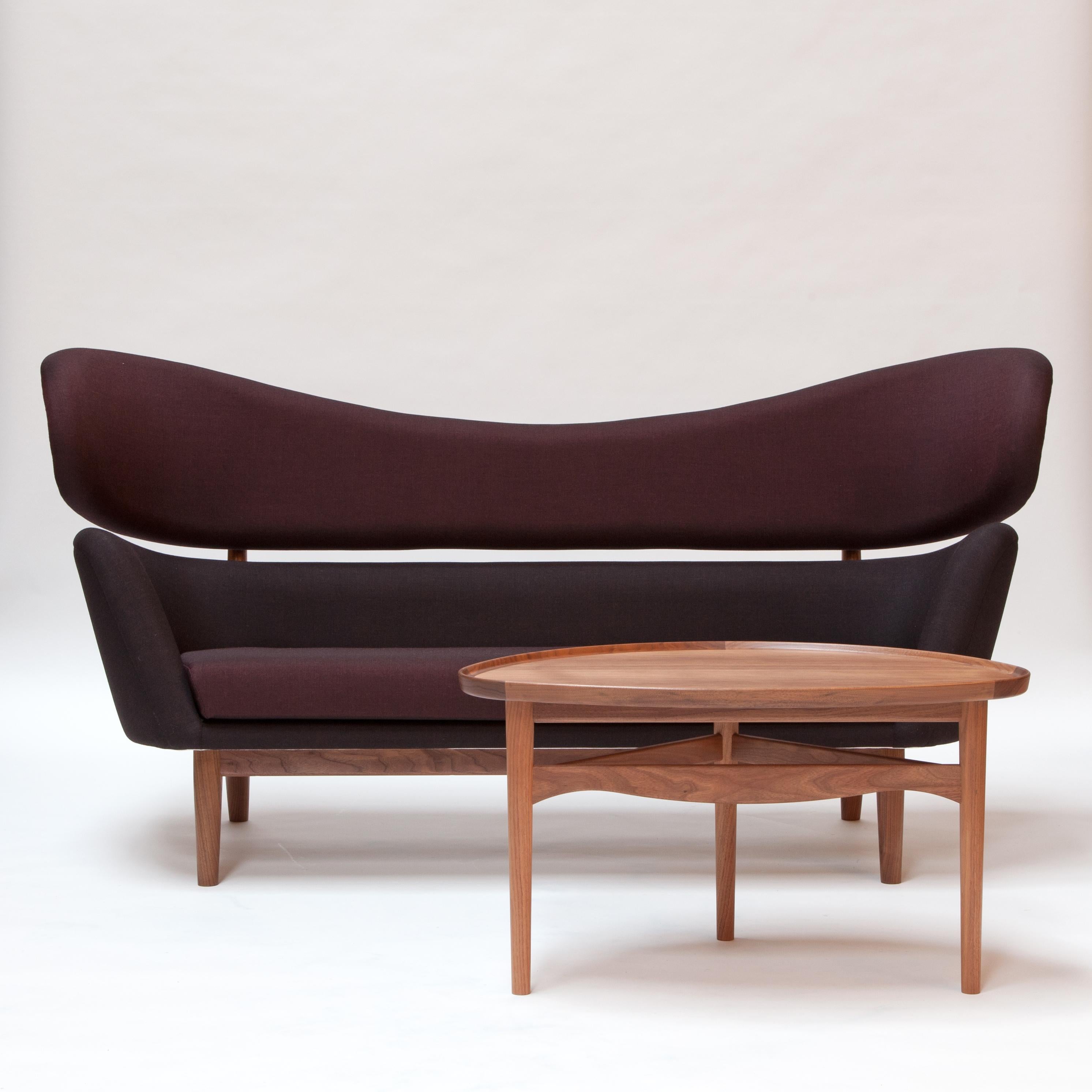 Sofa designed by Finn Juhl in 1951, relaunched in 2009.
Manufactured by House of Finn Juhl in Denmark.

Edgar Kaufmann Jr., a prolific art collector and director of the Industrial Design Department at the Museum of Modern Art in New York,