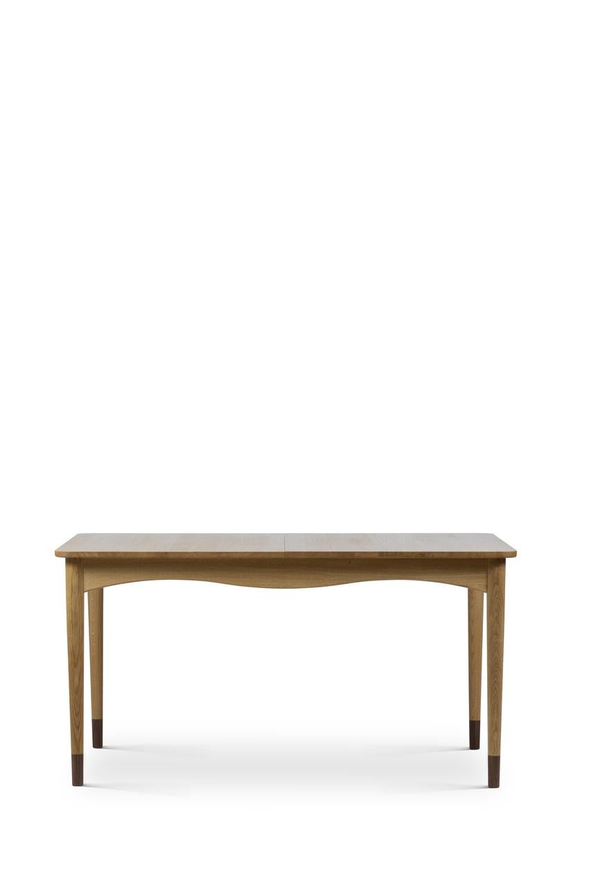 Table designed by Finn Juhl in 1948, relaunched in 2019.
Manufactured by House of Finn Juhl in Denmark.

The table, which House of Finn Juhl today has been given special permission to name the Bovirke Table, was presented at the exhibition 