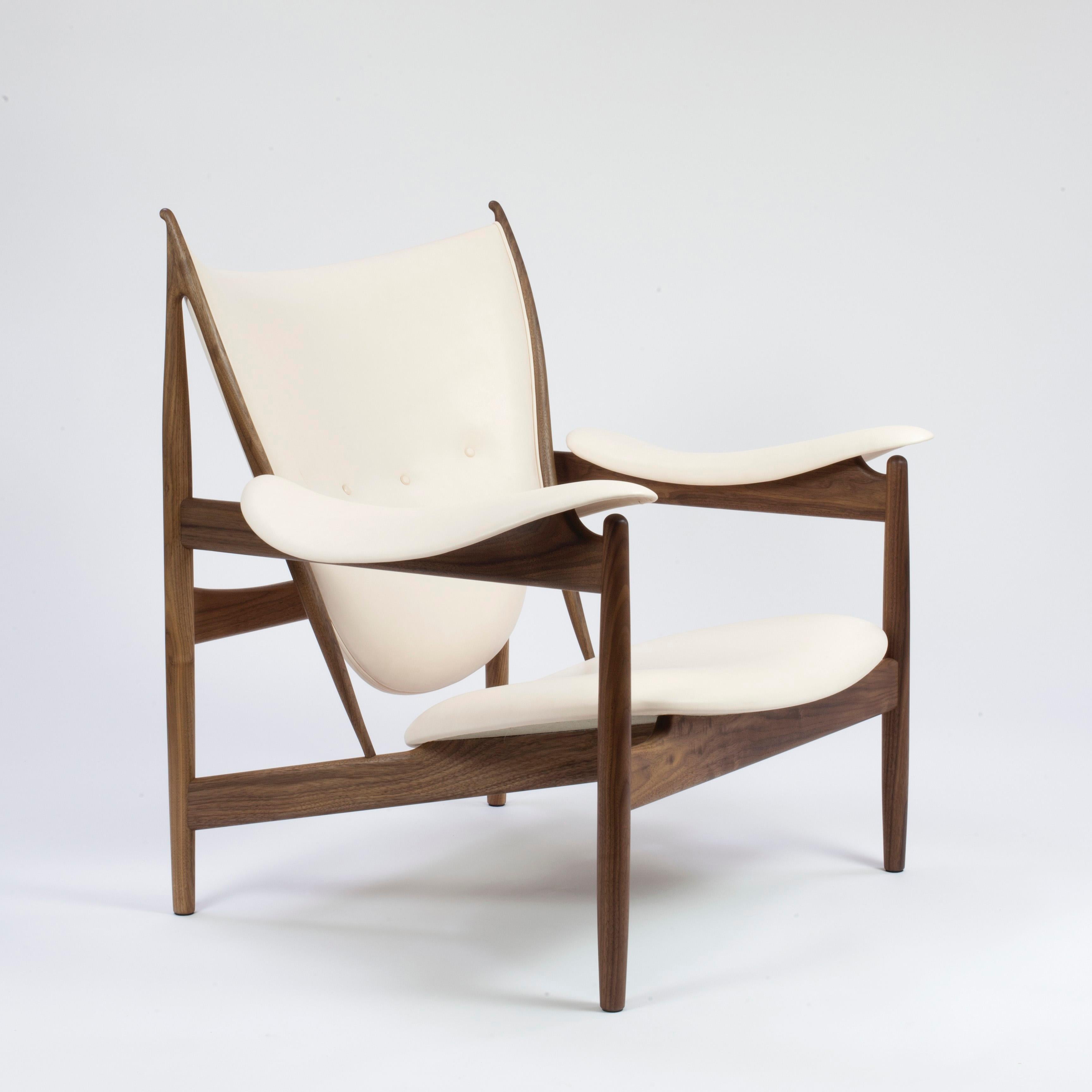 Chair designed by Finn Juhl in 1949, relaunched in 2002.
Manufactured by House of Finn Juhl in Denmark.

The iconic Chieftain Chair is one of Finn Juhl’s absolute masterpieces, representing the peak of his career as a furniture designer. At its